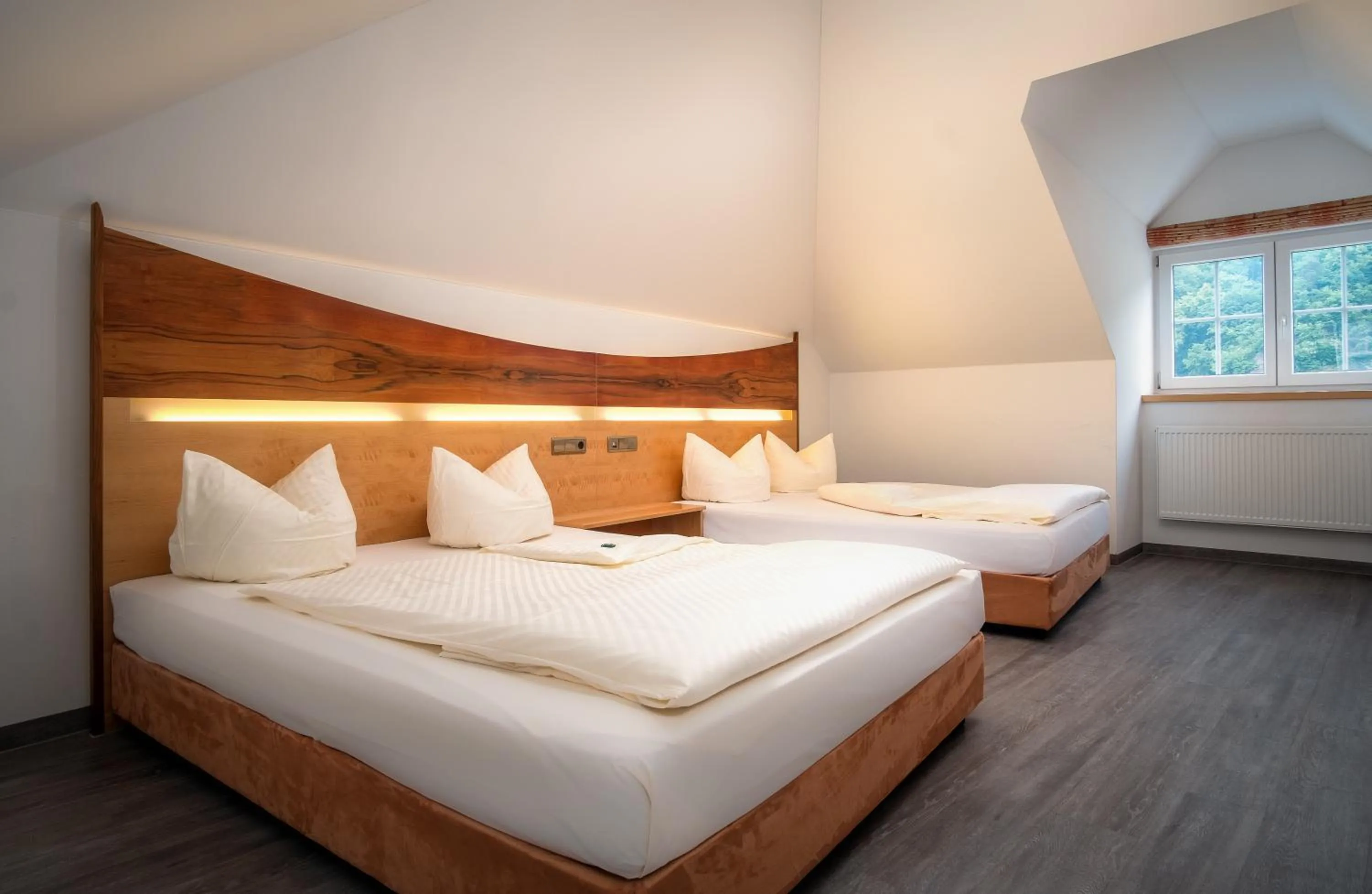 Bed in Hotel Passauer Wolf