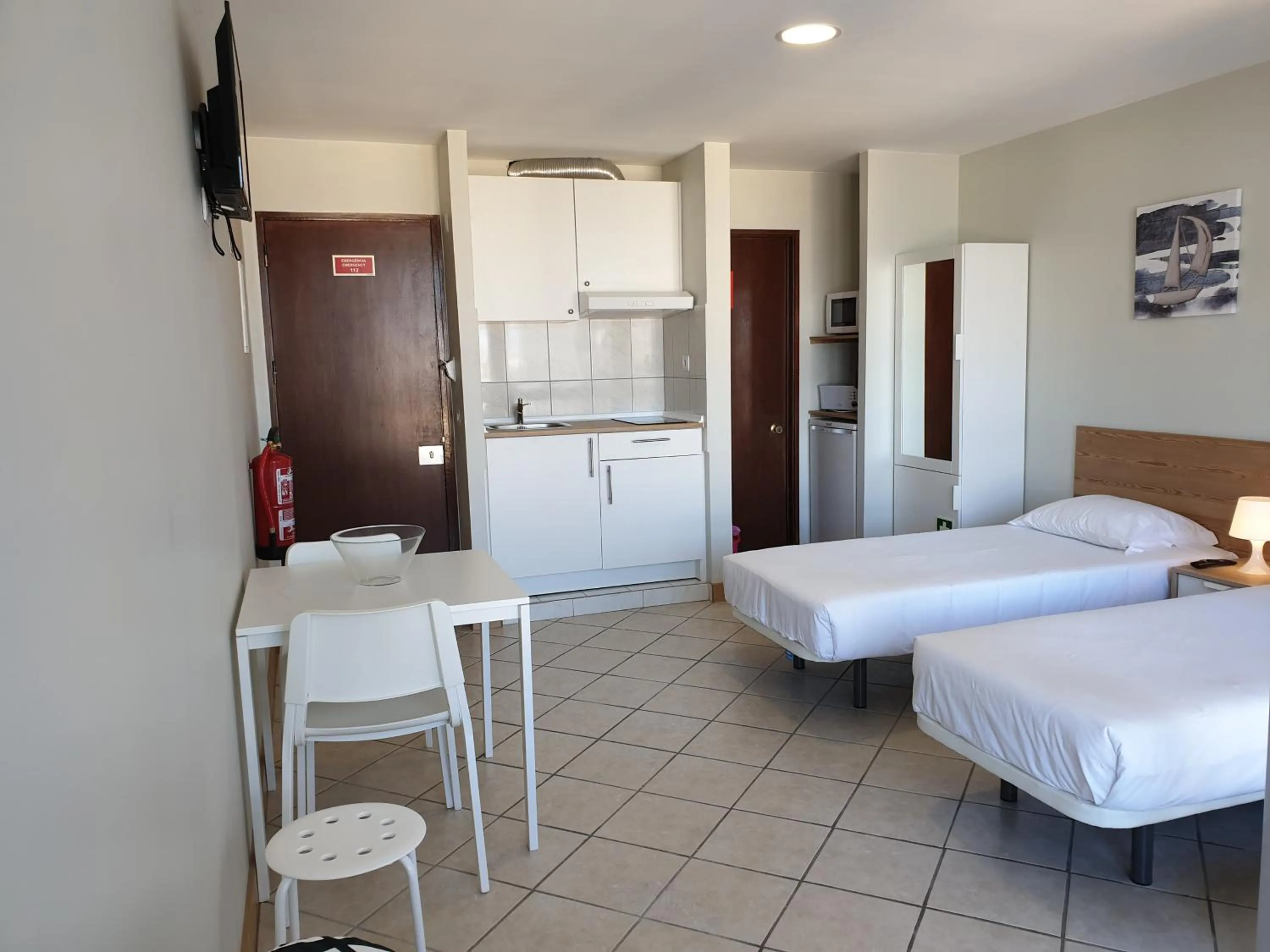 Photo of the whole room, Bed in Tarik by Atlantichotels - AL