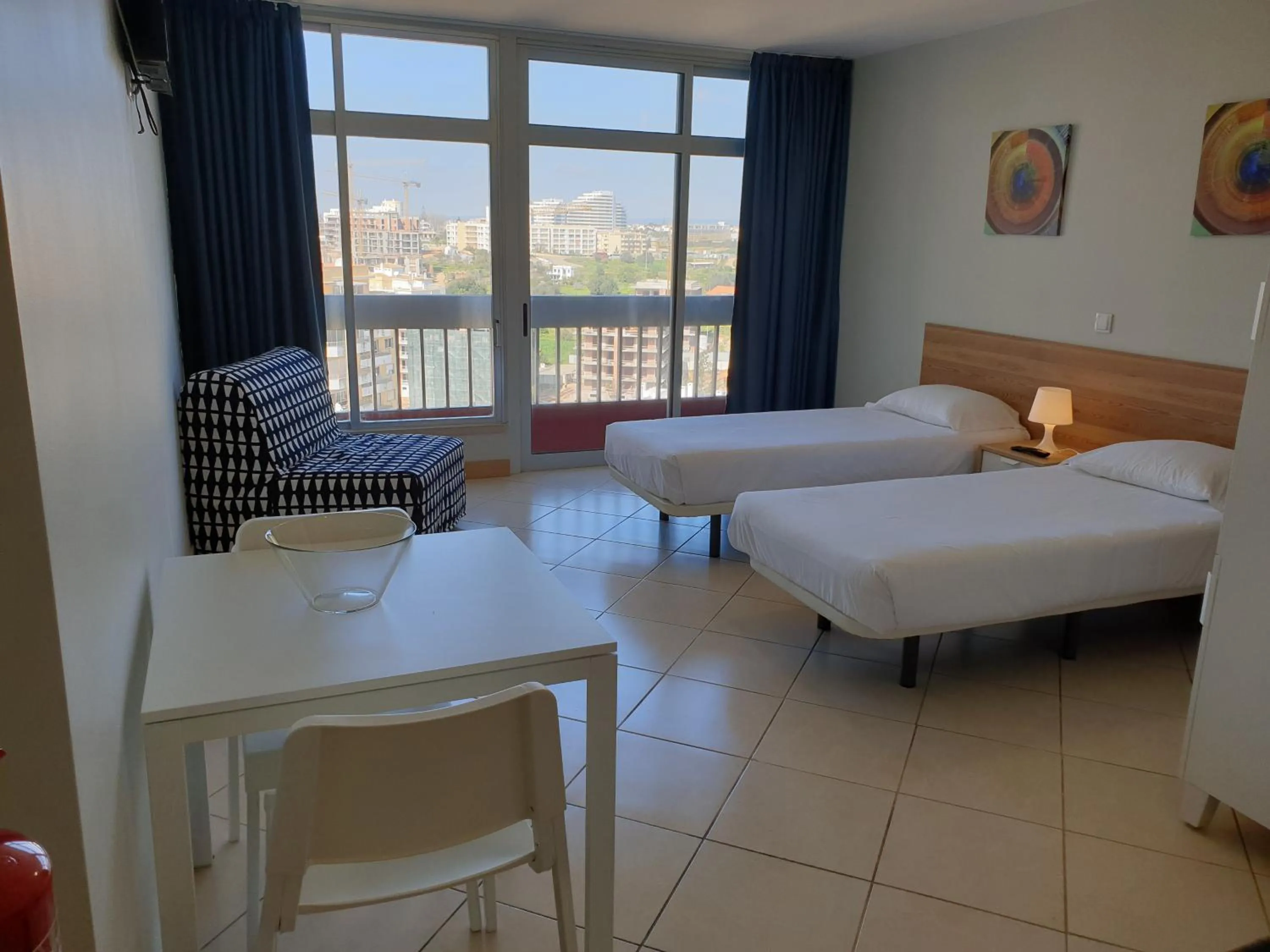 Photo of the whole room, Bed in Tarik by Atlantichotels - AL