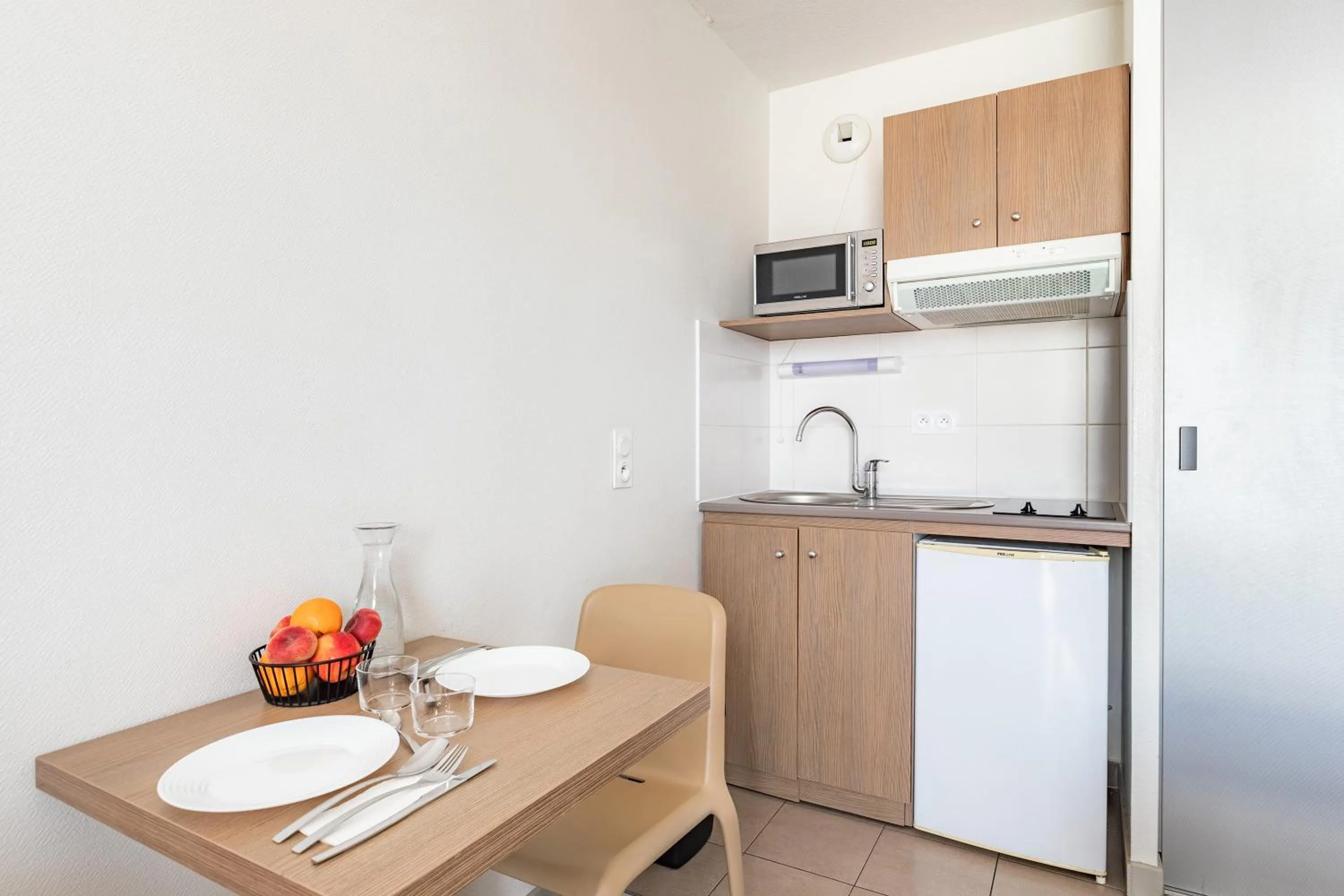 Kitchen or kitchenette in Appart'City Confort Perpignan Centre Gare