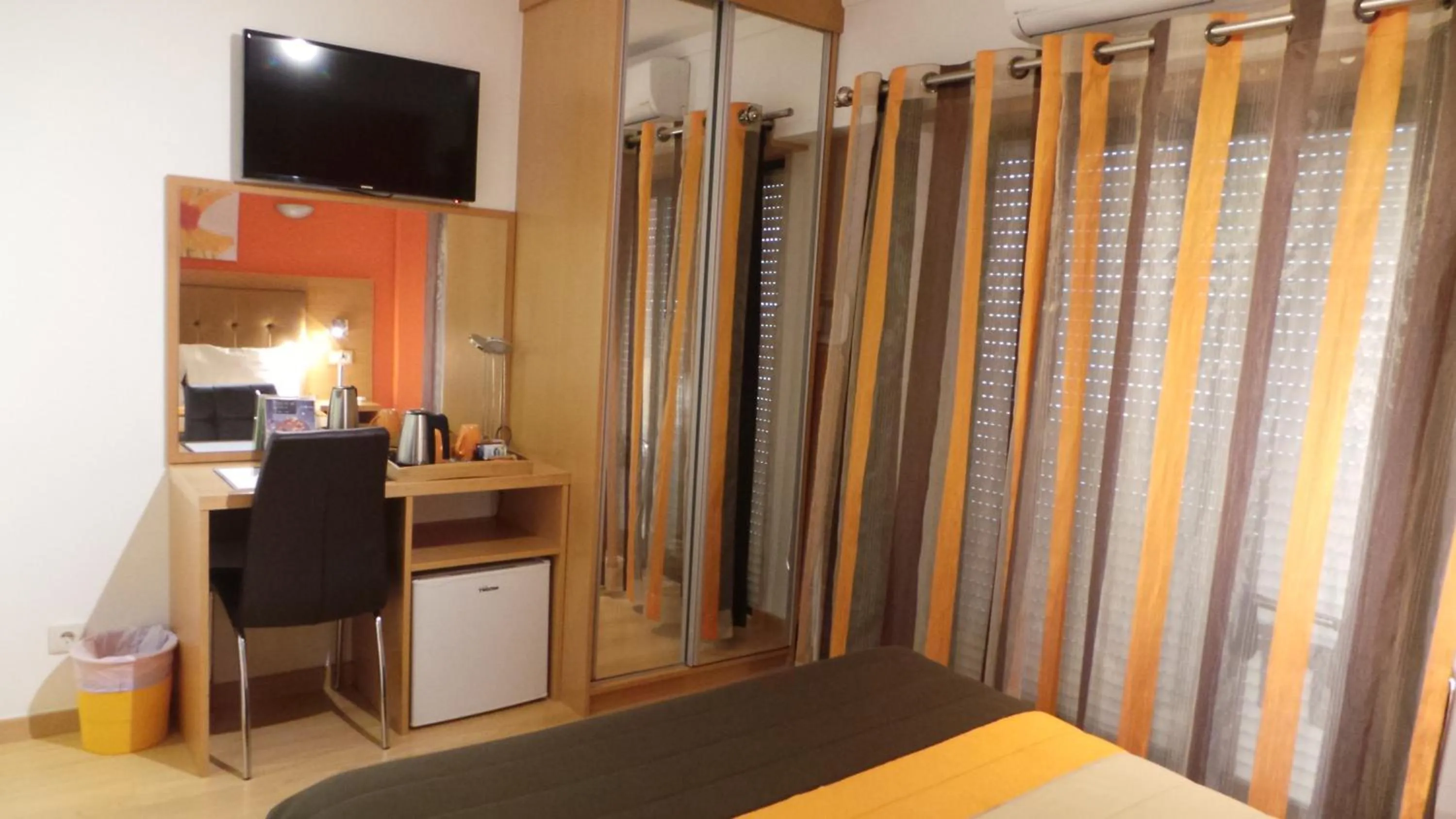 Bedroom in Dom João Glamour Hotel