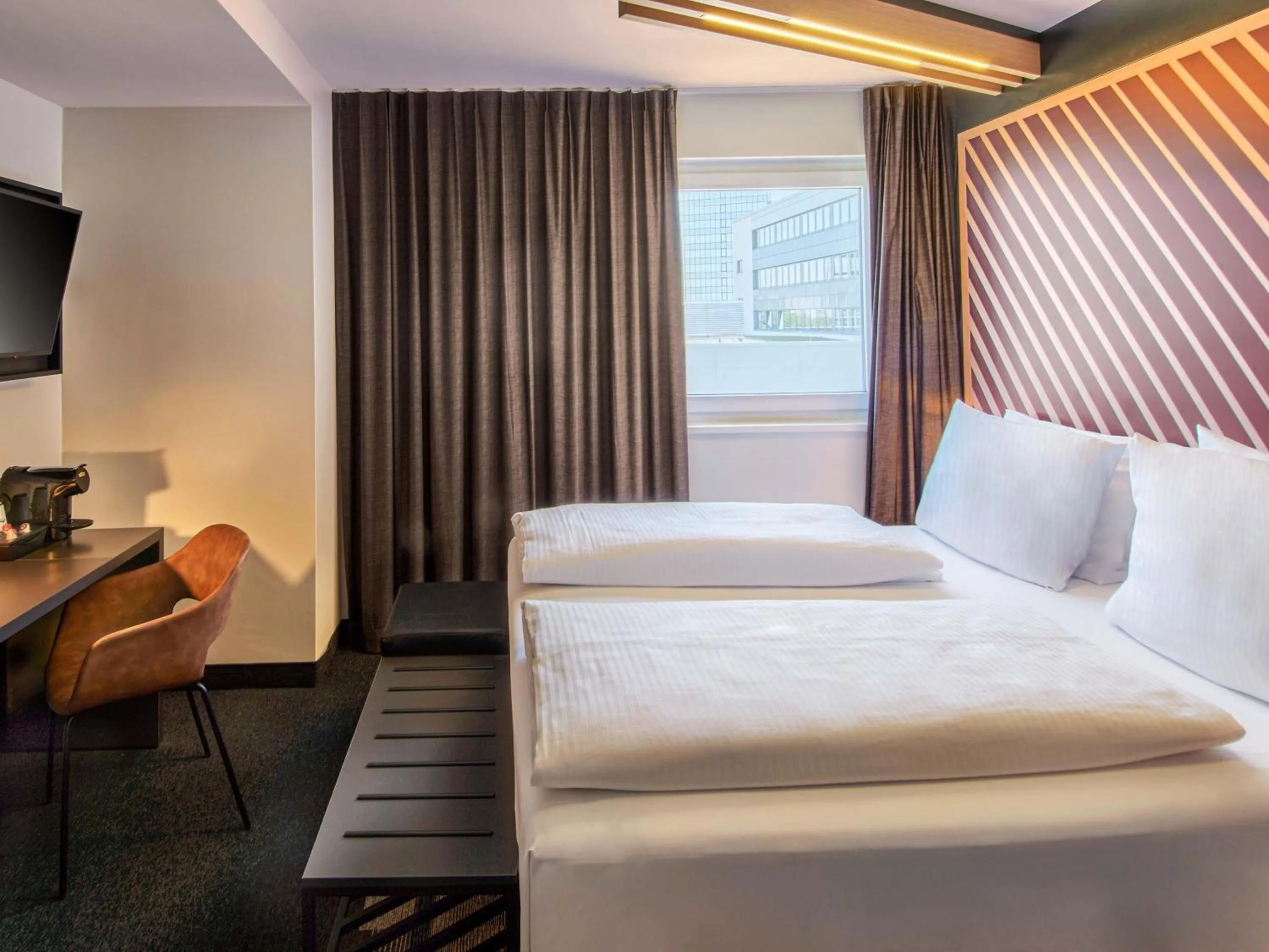 Photo of the whole room, Bed in B&B HOTEL Frankfurt-Niederrad