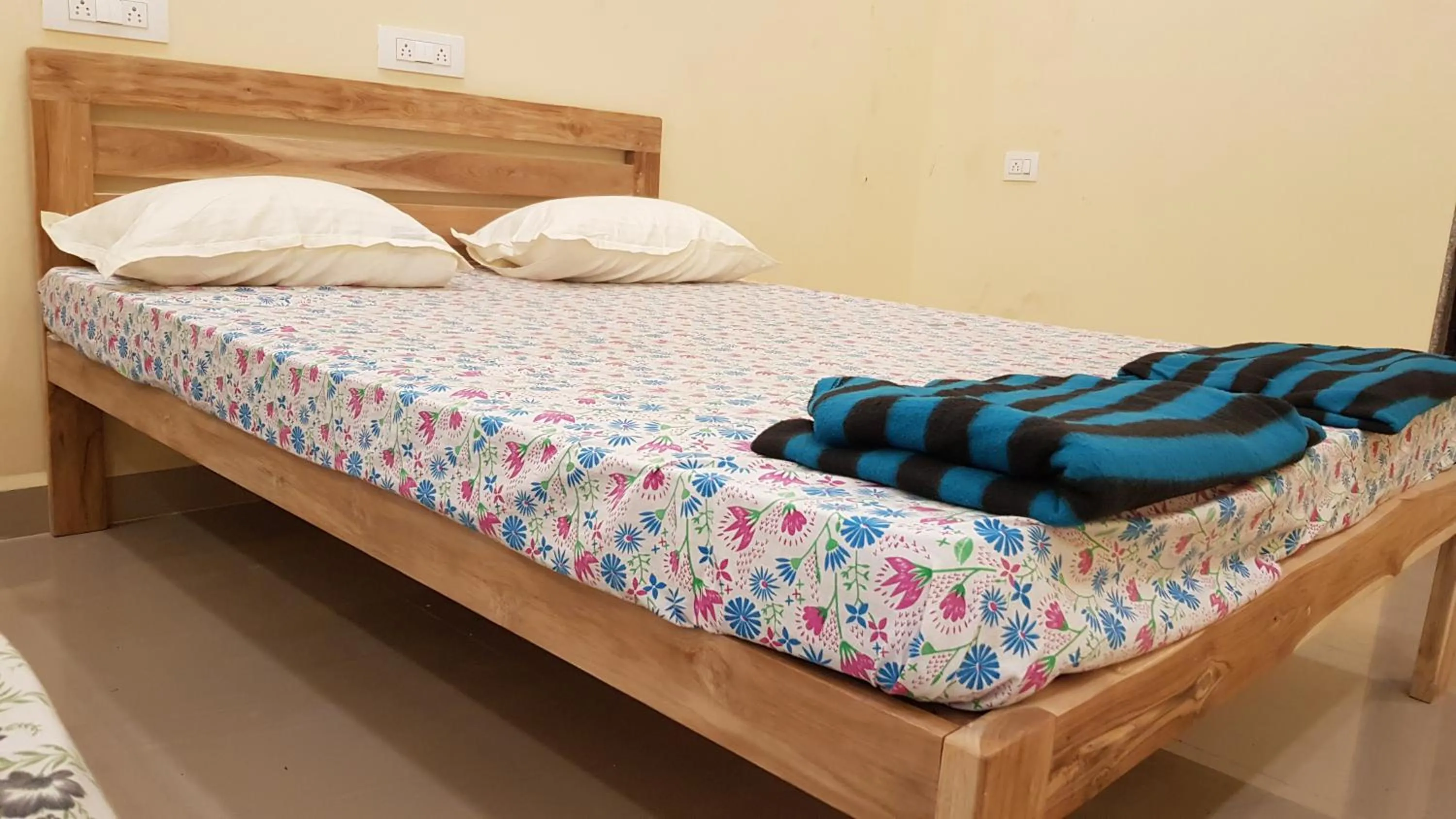 Bed in Godwill Kimo Guest house Seraulim