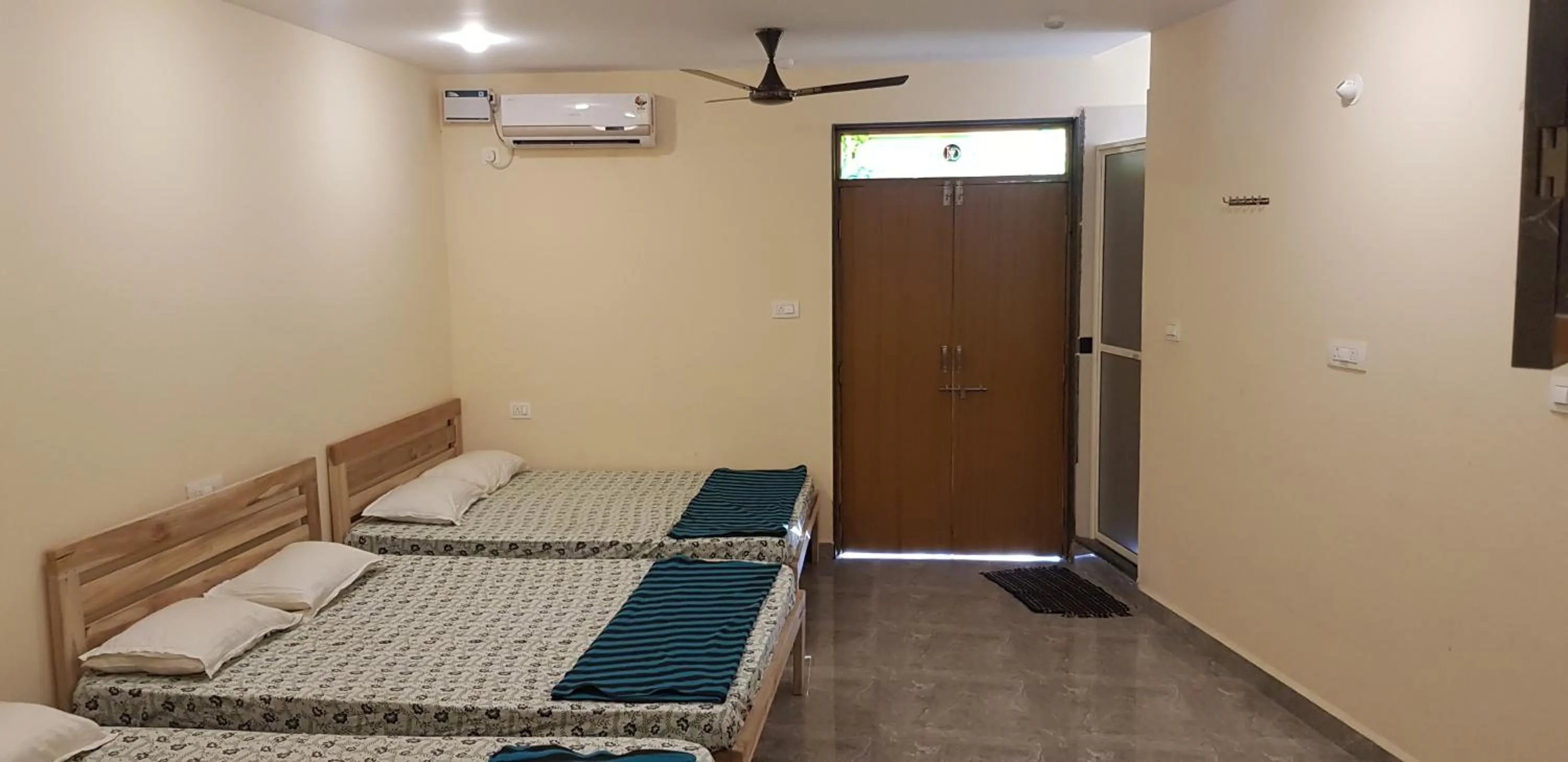 Bed in Godwill Kimo Guest house Seraulim