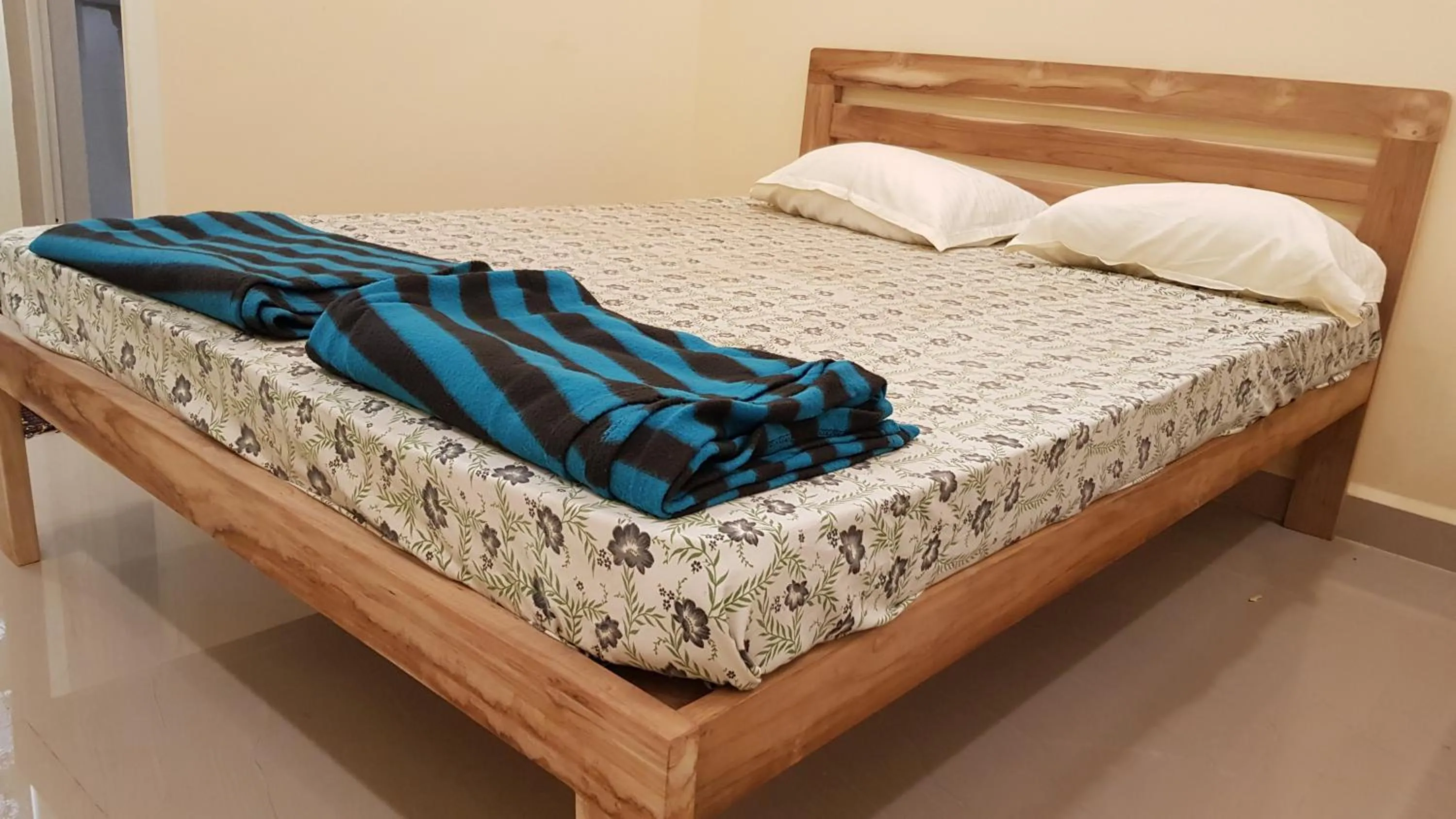 Bed in Godwill Kimo Guest house Seraulim