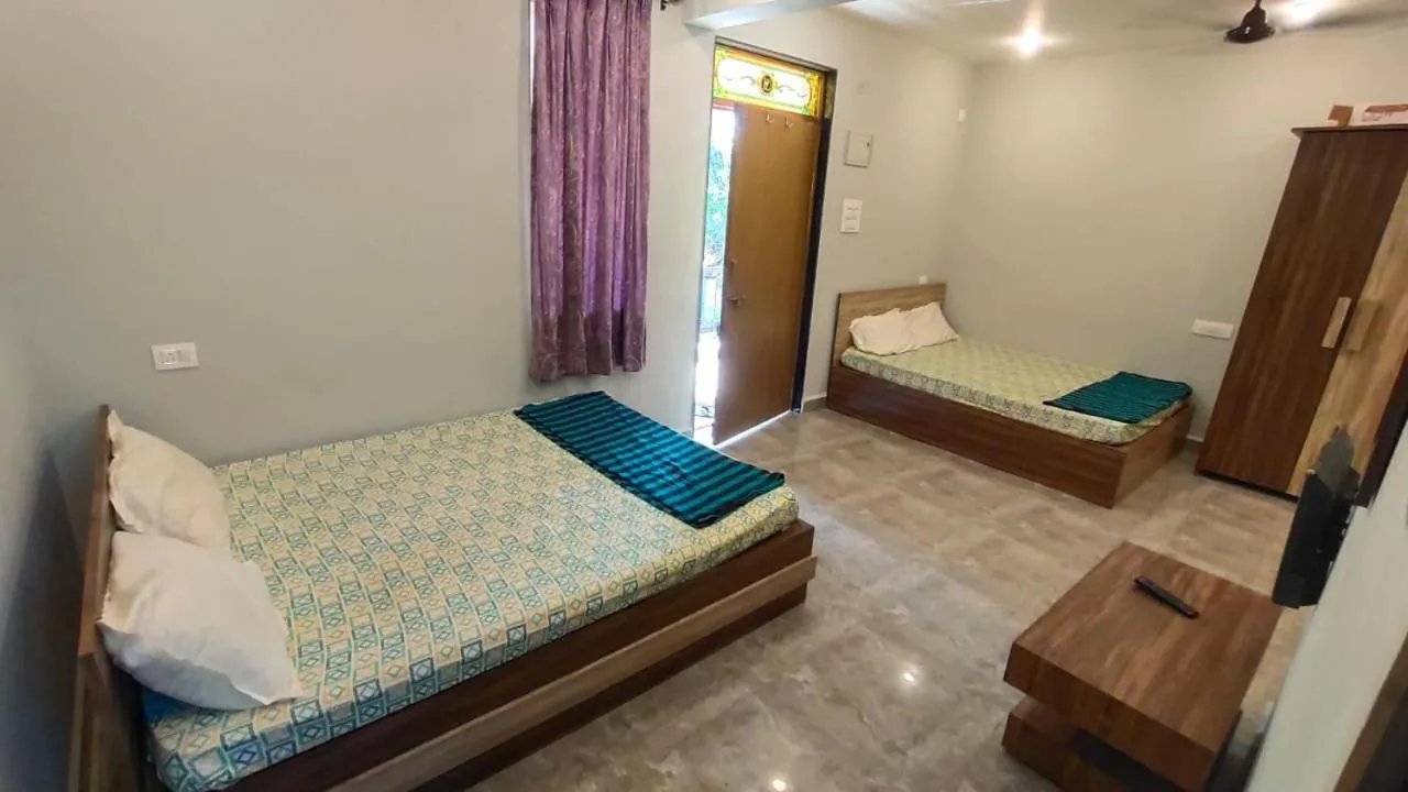 Bed in Godwill Kimo Guest house Seraulim