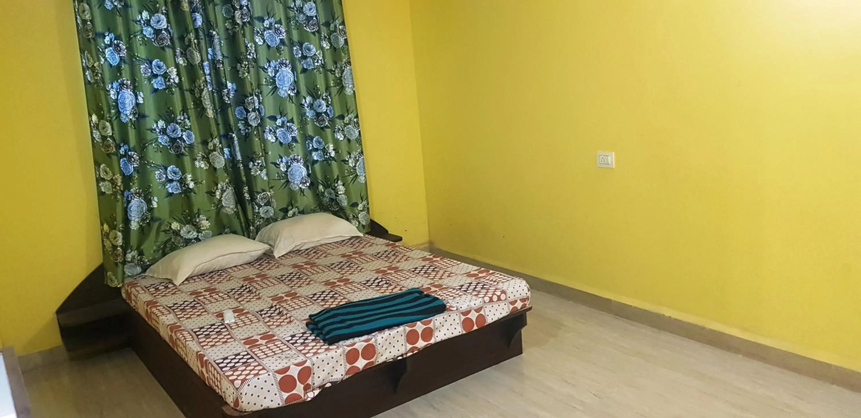 Bed in Godwill Kimo Guest house Seraulim