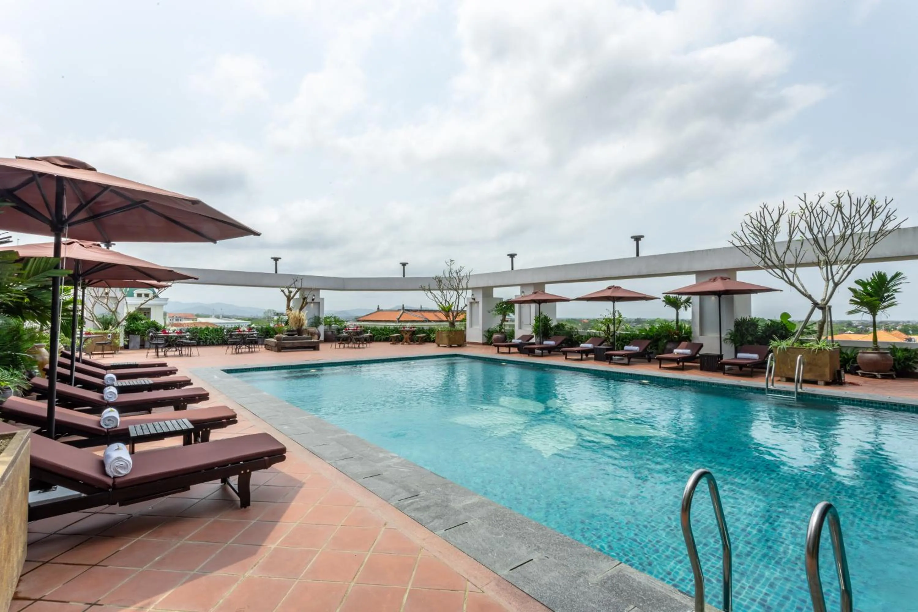 Swimming pool in White Lotus Hue Hotel