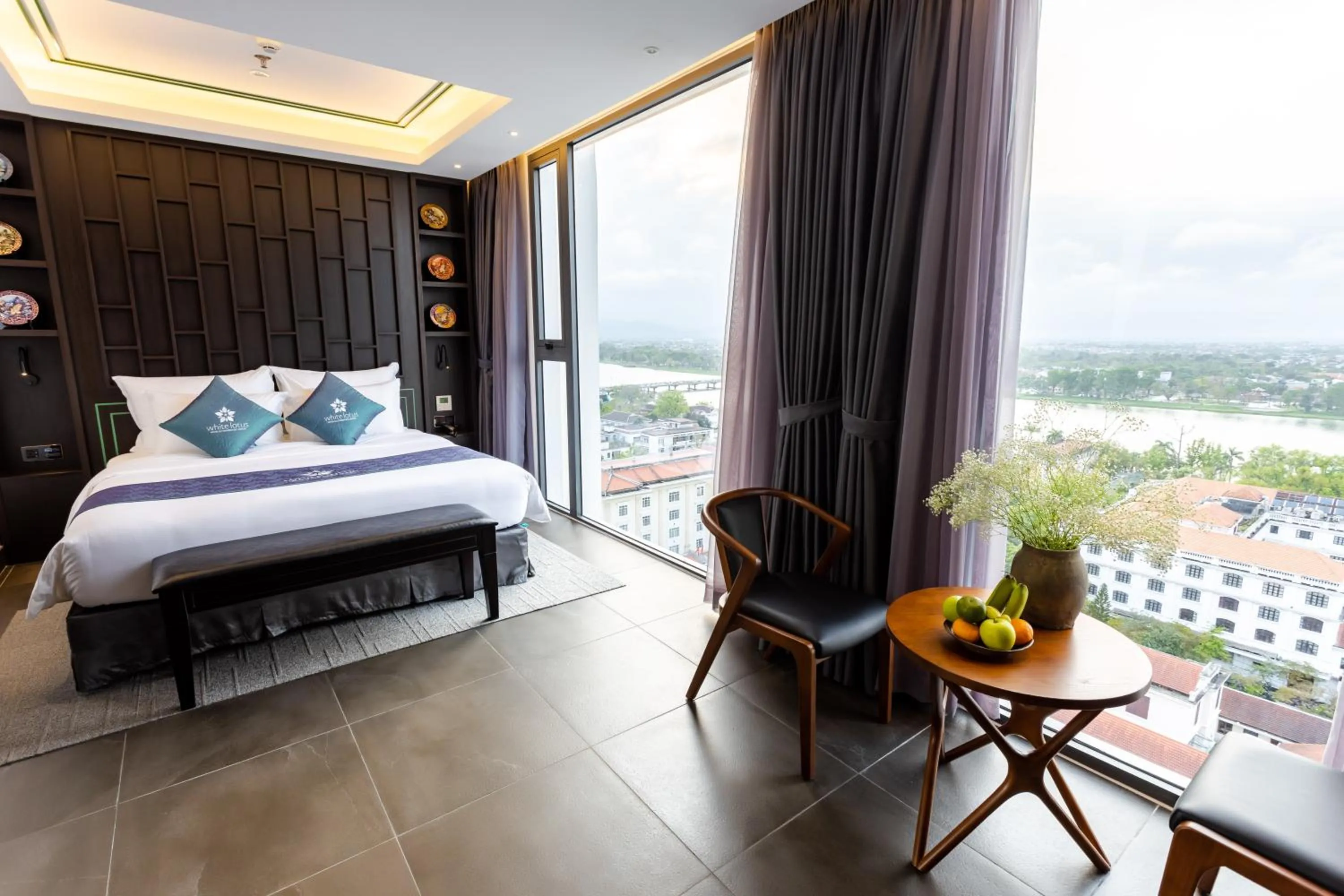 Photo of the whole room, Bed in White Lotus Hue Hotel