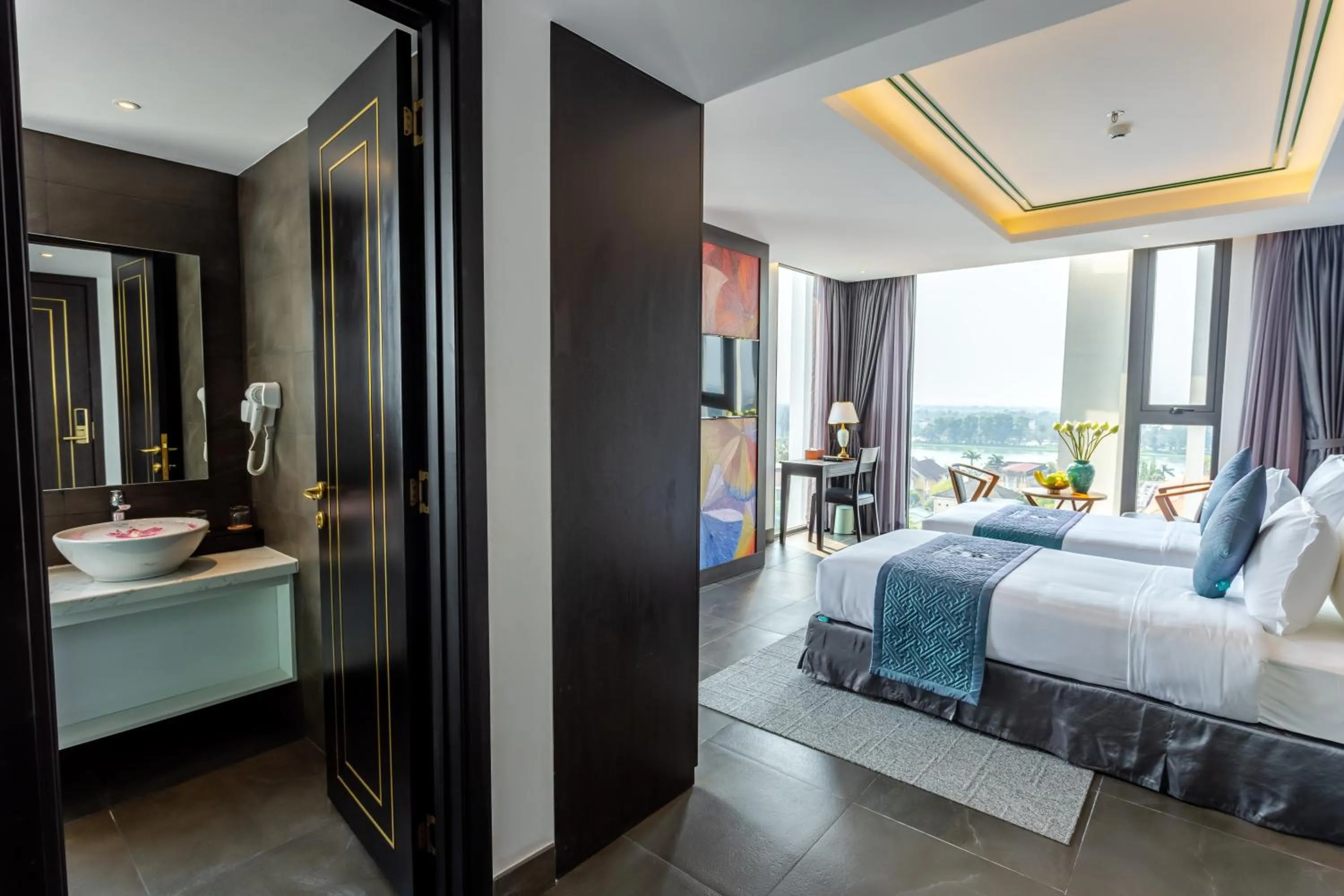 Photo of the whole room, Bed in White Lotus Hue Hotel