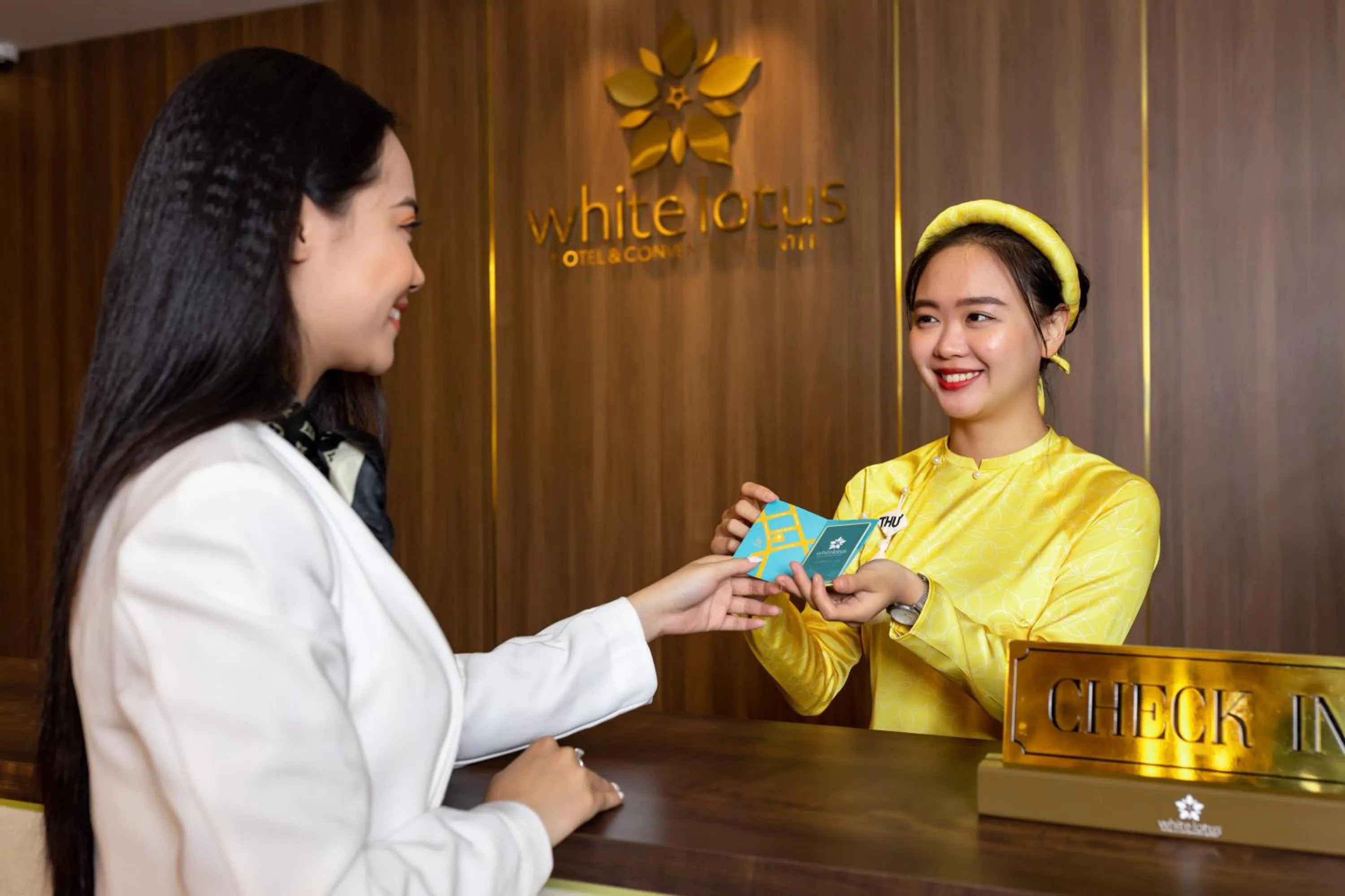 Staff in White Lotus Hue Hotel