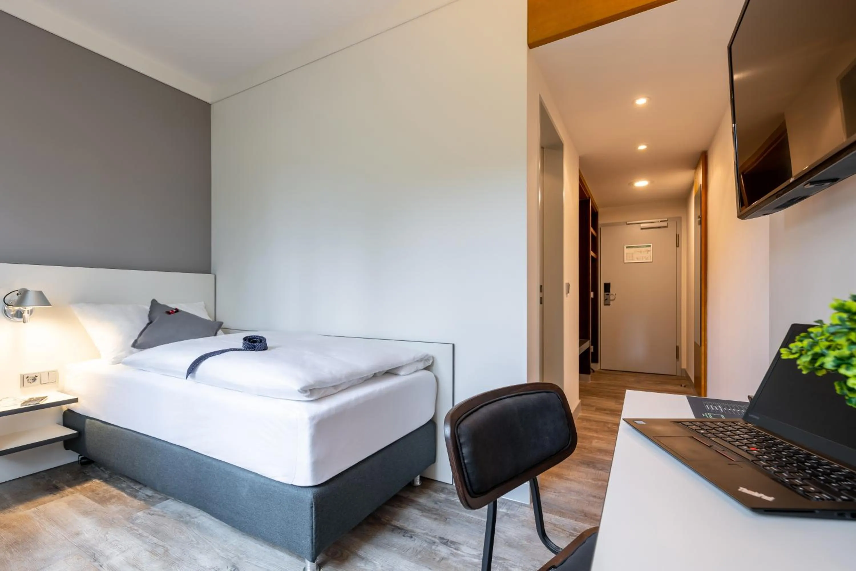 Photo of the whole room, Bed in Hotel Leipheim Süd