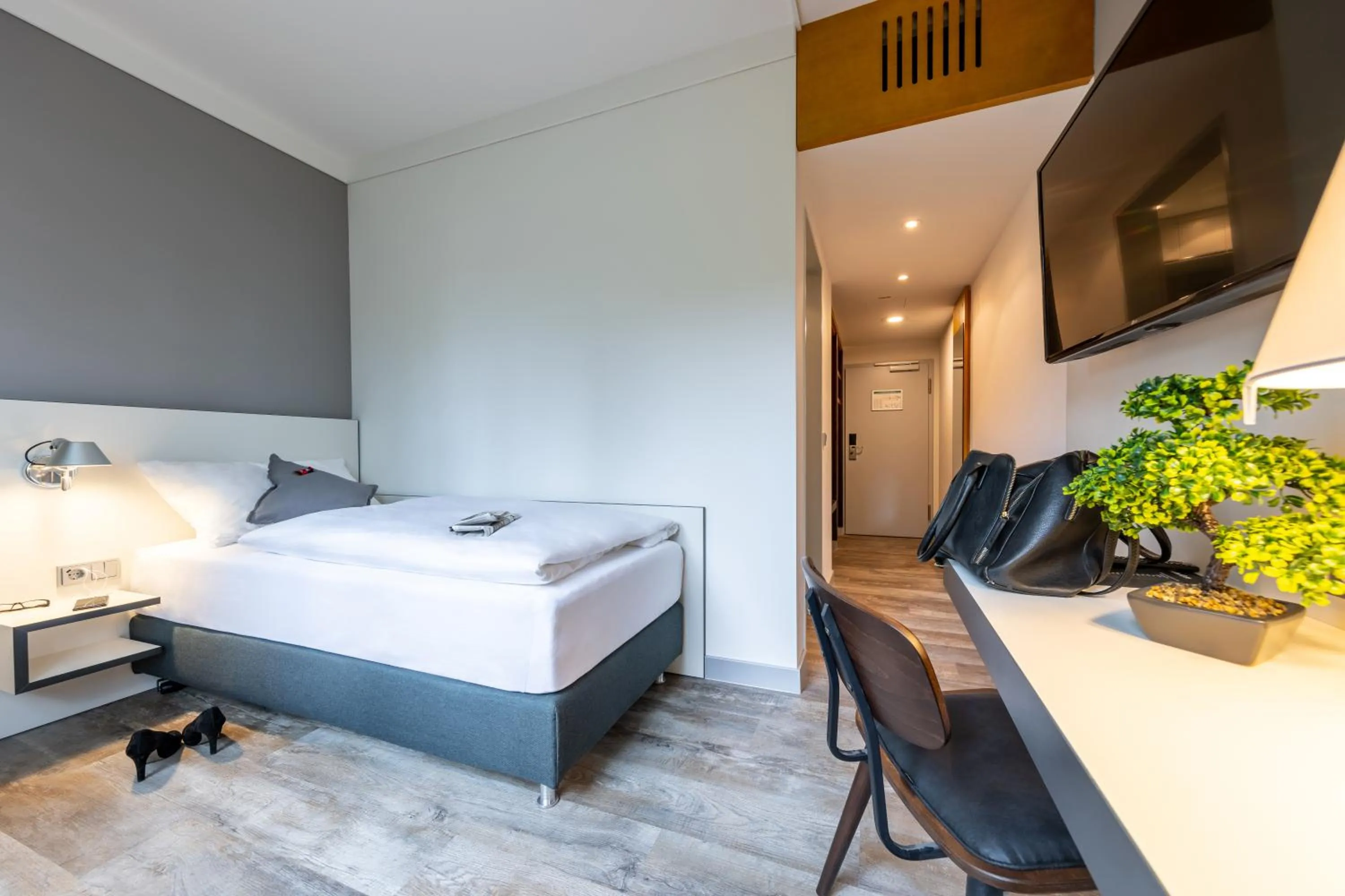 Photo of the whole room, Bed in Hotel Leipheim Süd