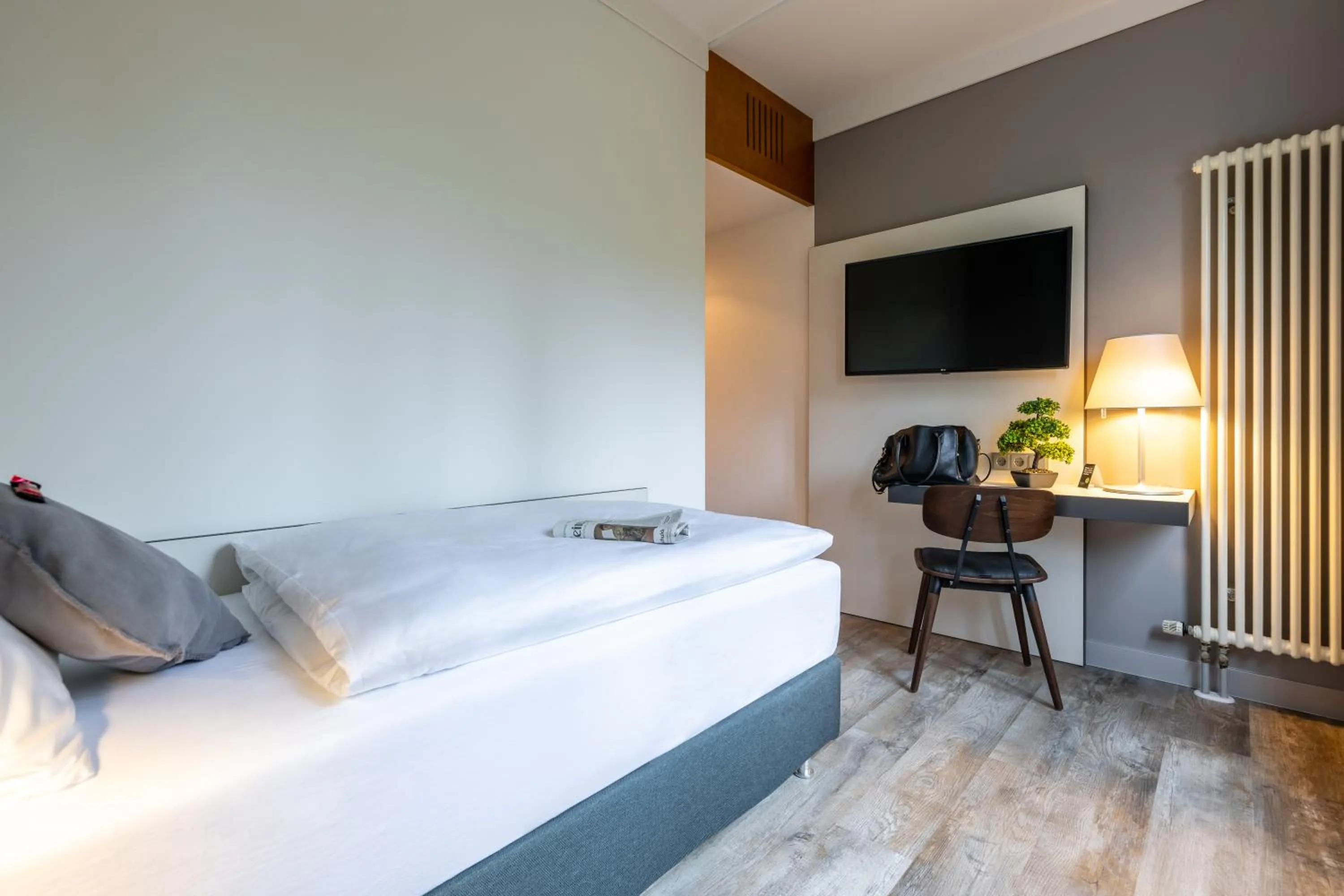 Photo of the whole room, Bed in Hotel Leipheim Süd