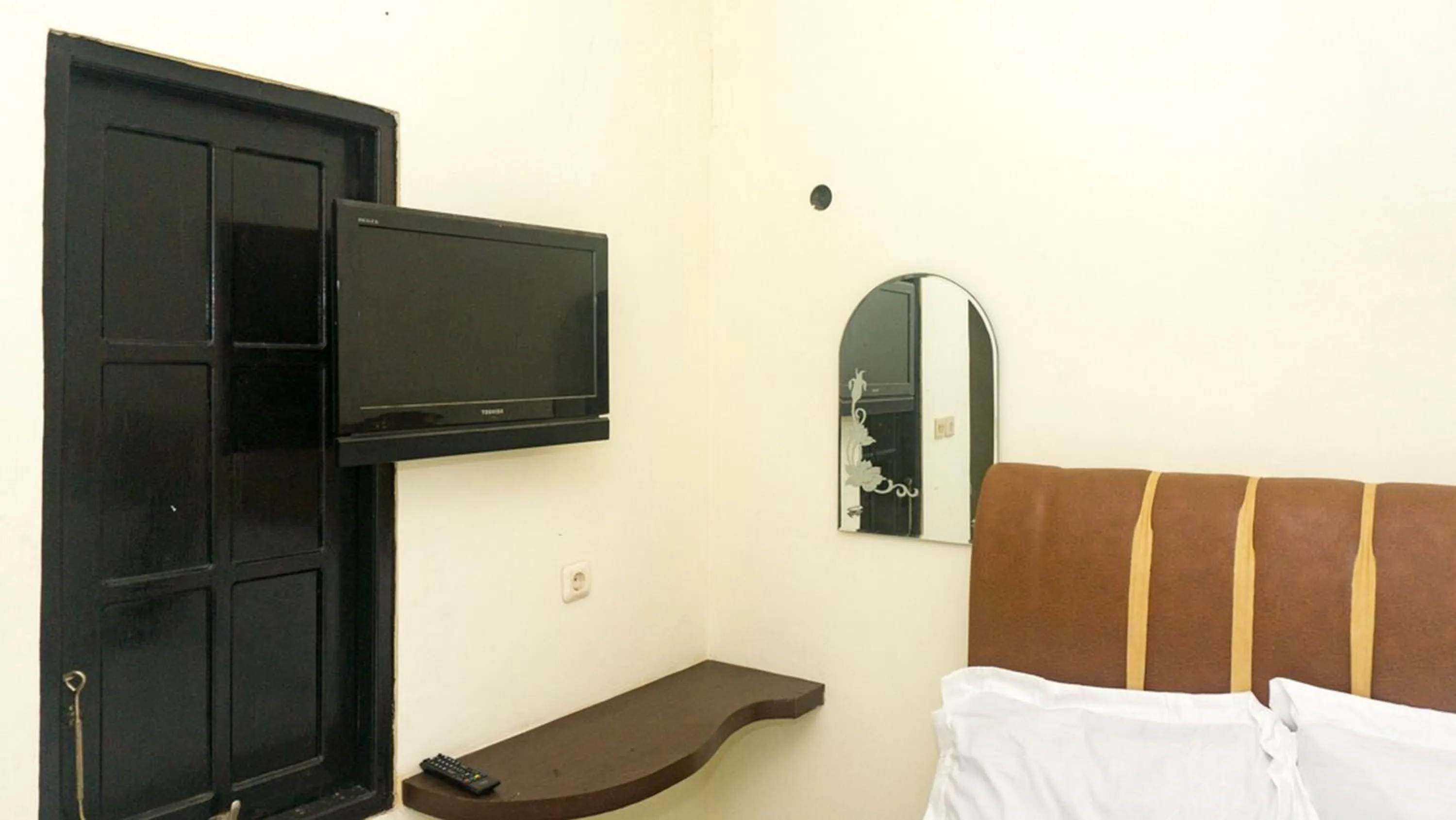 Bed in RedDoorz near Sentani Airport Jayapura