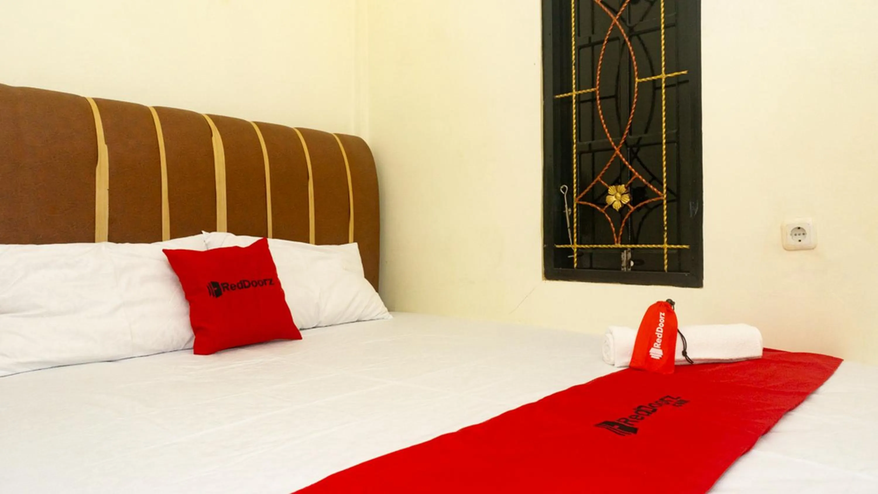 Bed in RedDoorz near Sentani Airport Jayapura