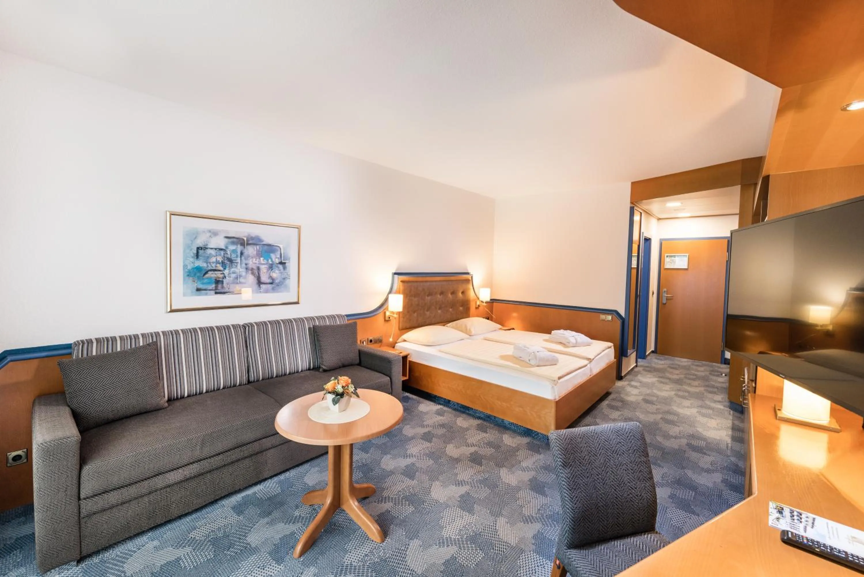 Photo of the whole room, Bed in Posthotel Rotenburg