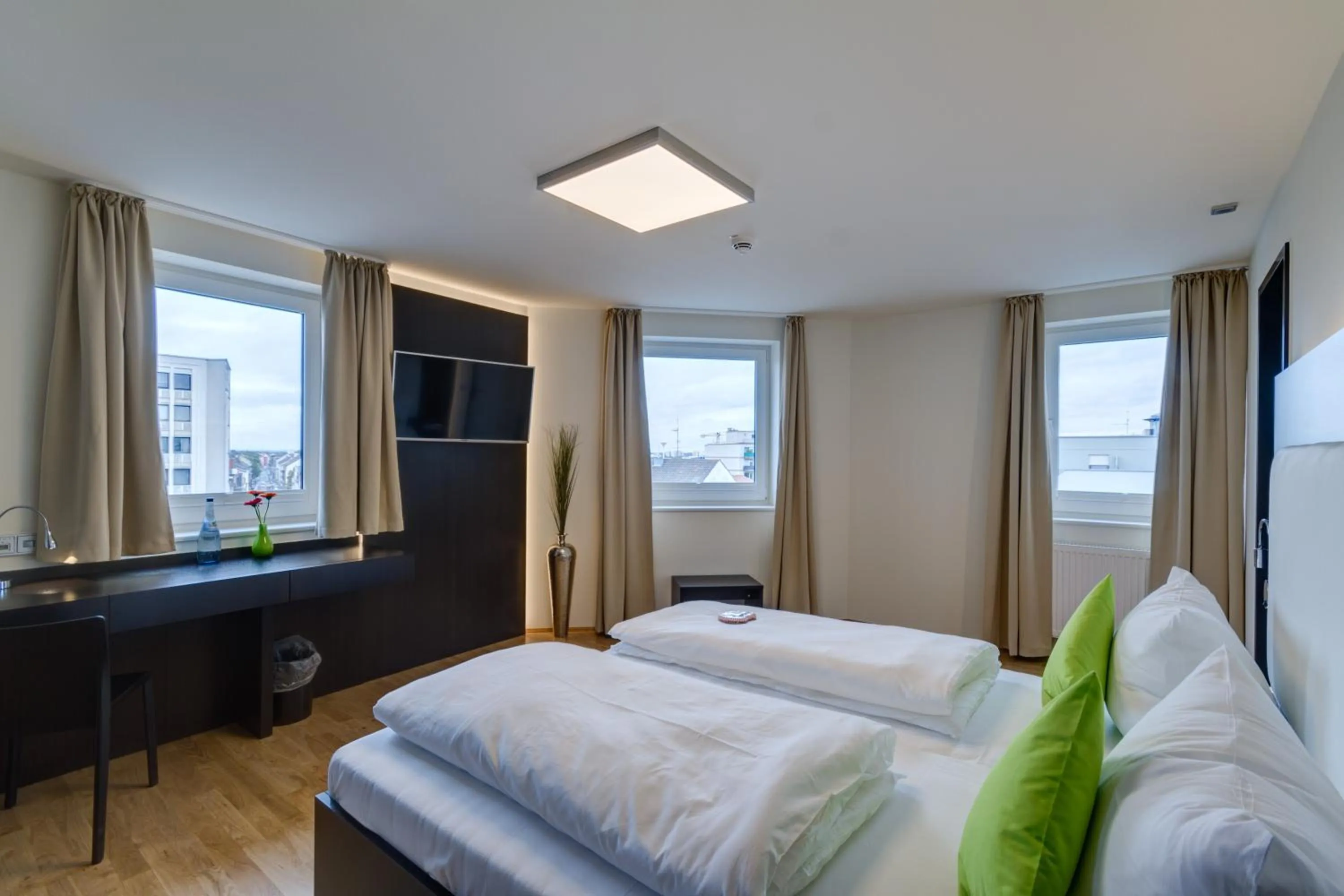 Bedroom, Bed in sevenDays Hotel BoardingHouse Mannheim