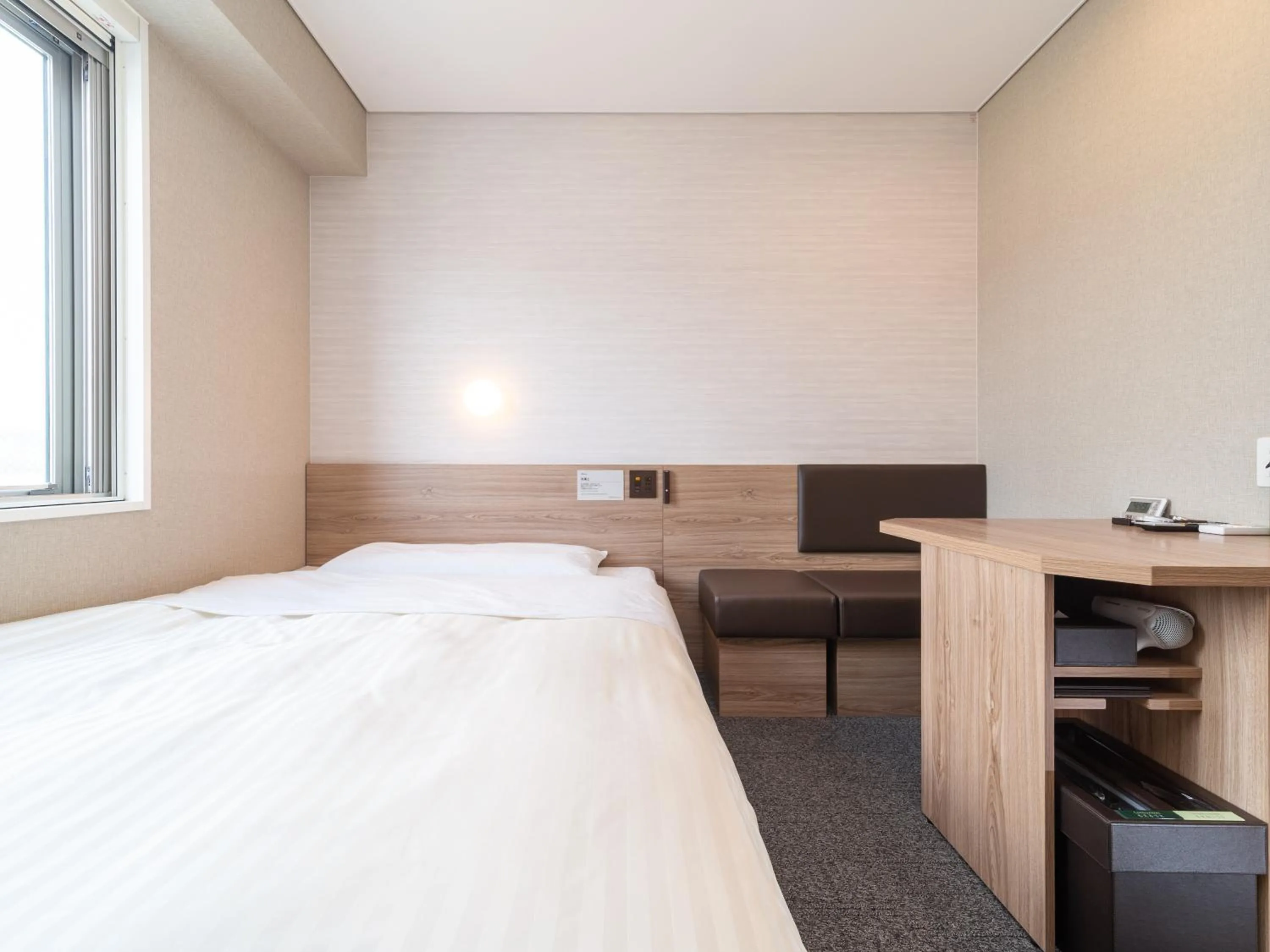 Bed in Super Hotel Higashi-Maizuru