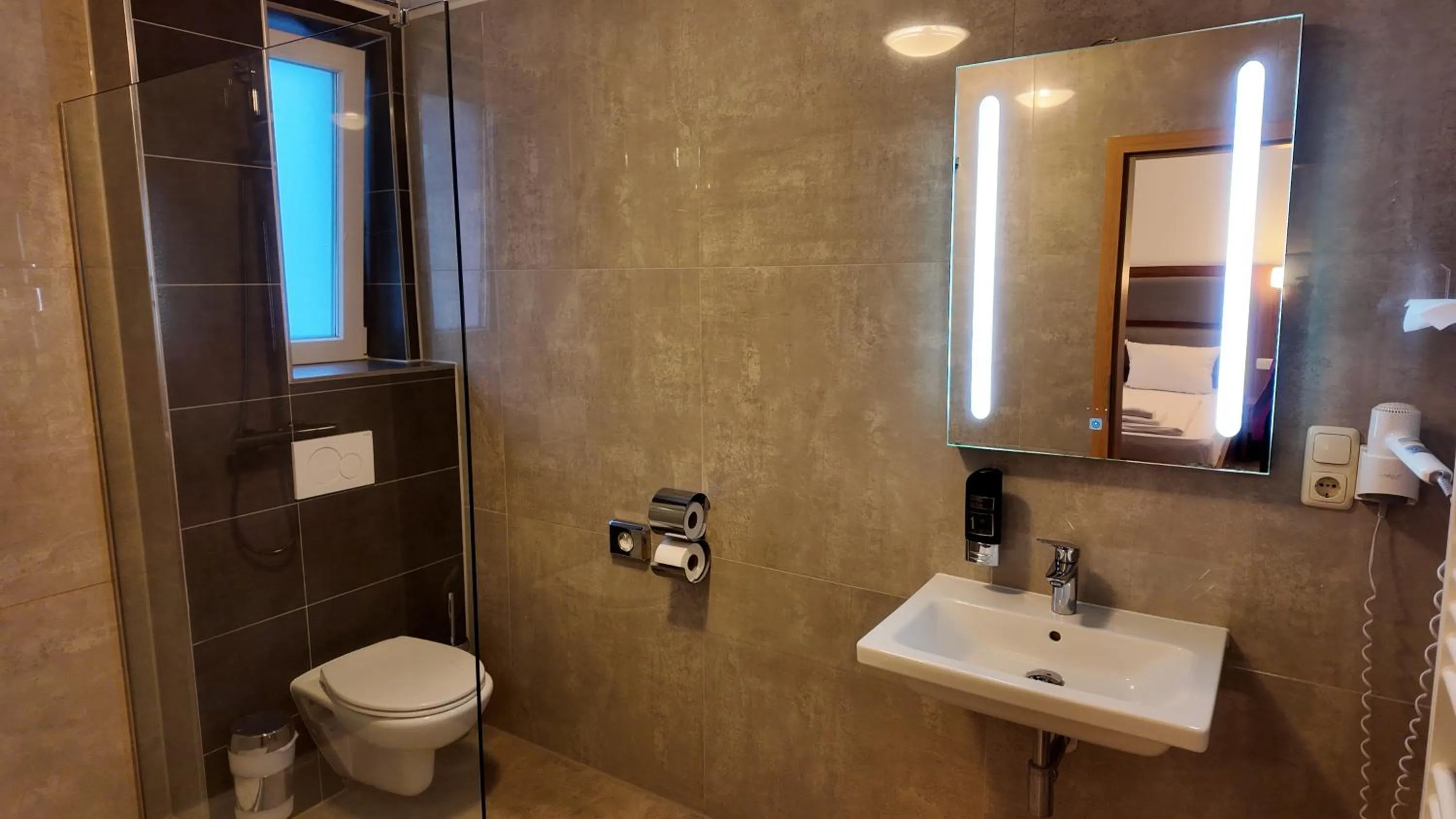 Bathroom in Airport Global Hotel