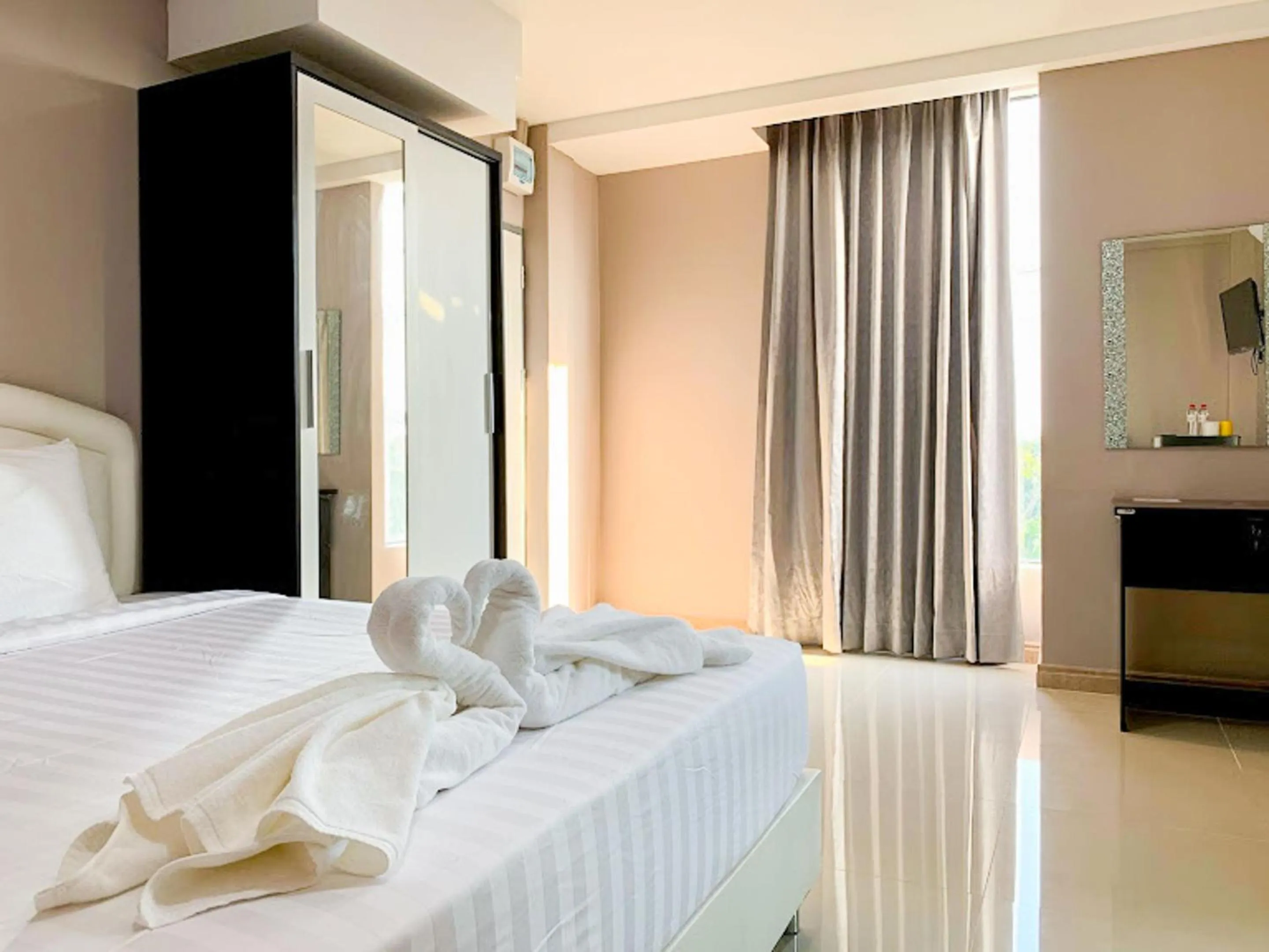 Bed in Delighted Bangkok Hotel