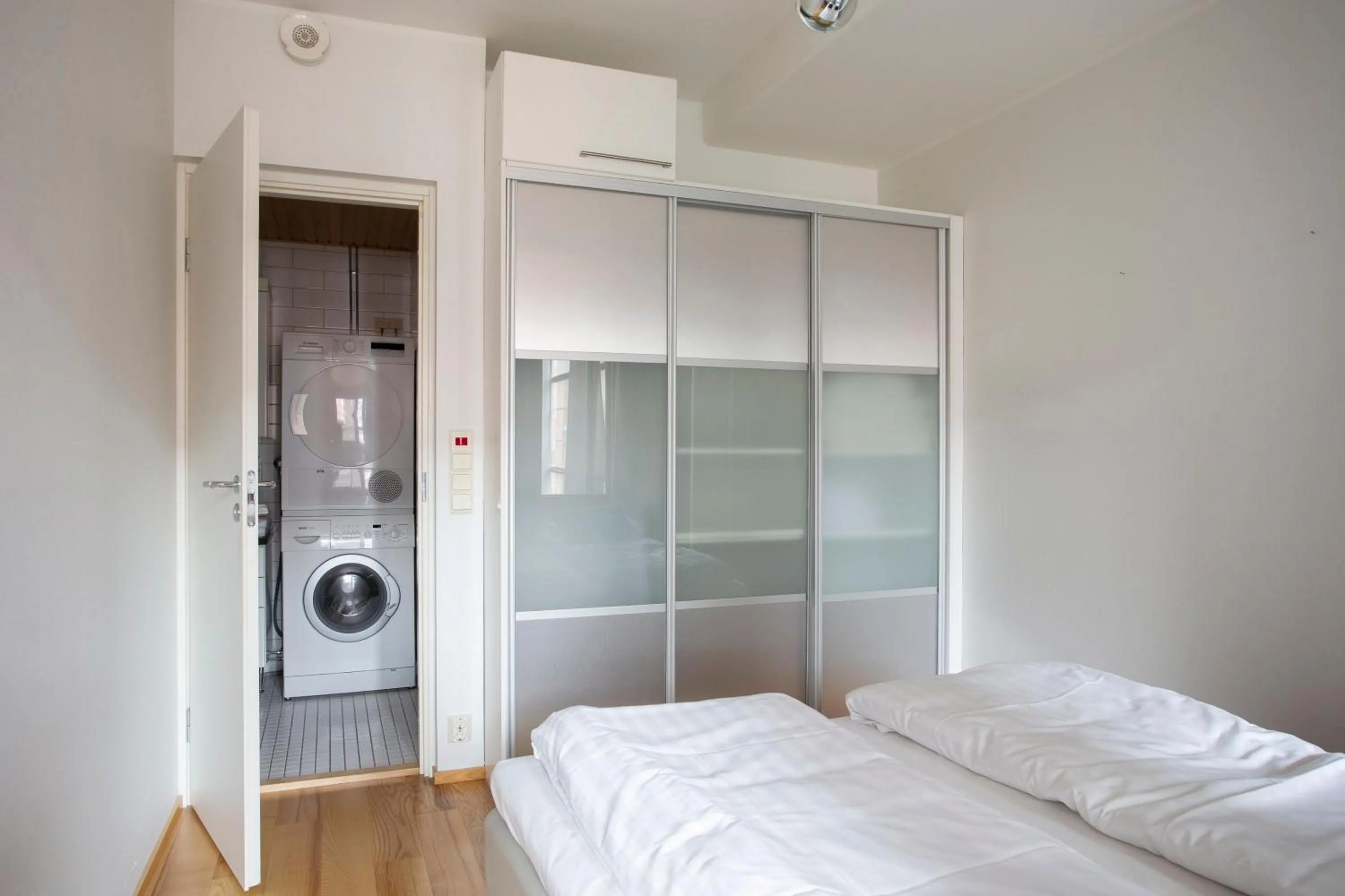 Bed in 2ndhomes Deluxe 1BR Kamppi Center Apartment with Sauna and Terrace