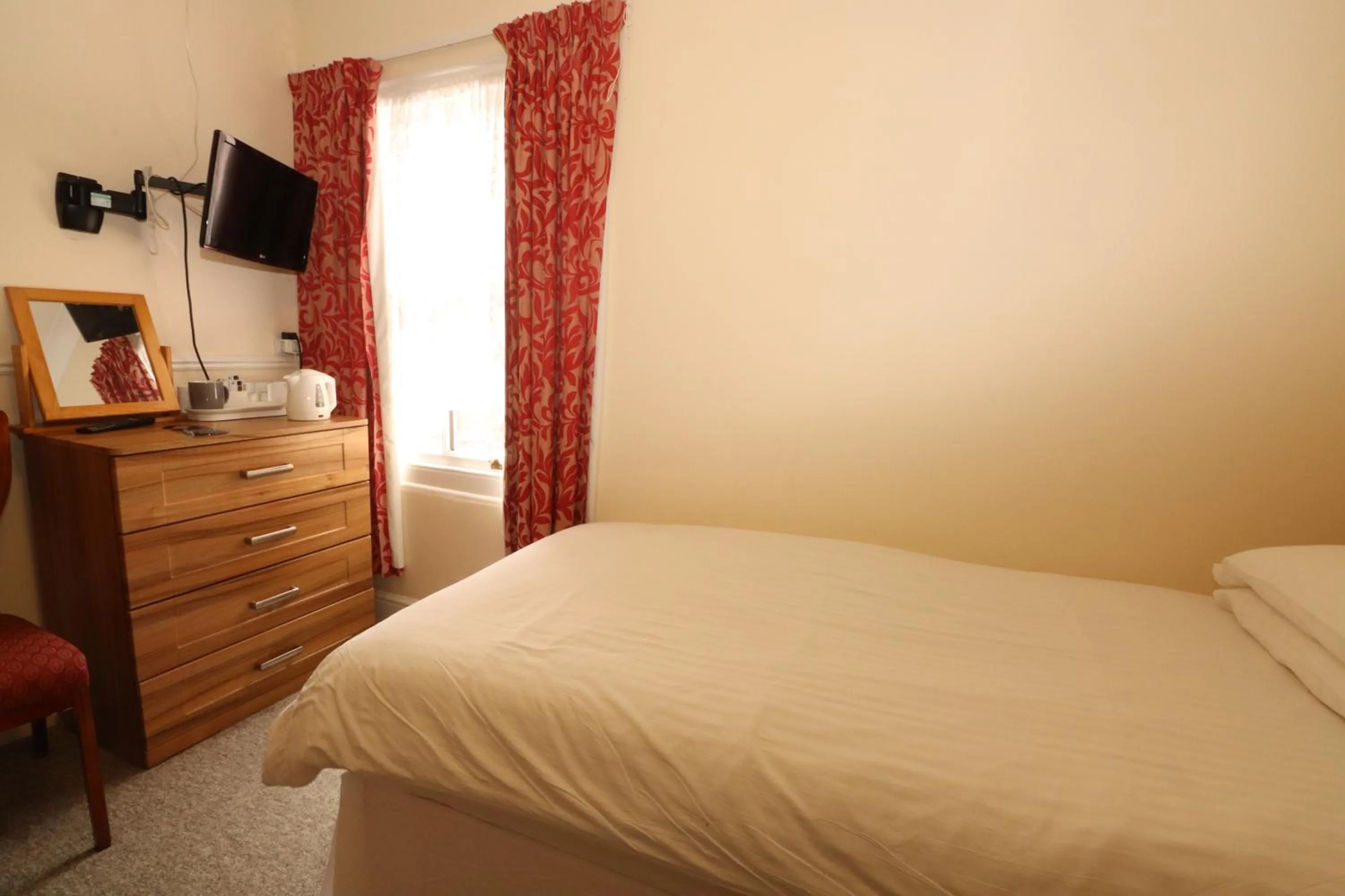 Bed in Daish's Hotel