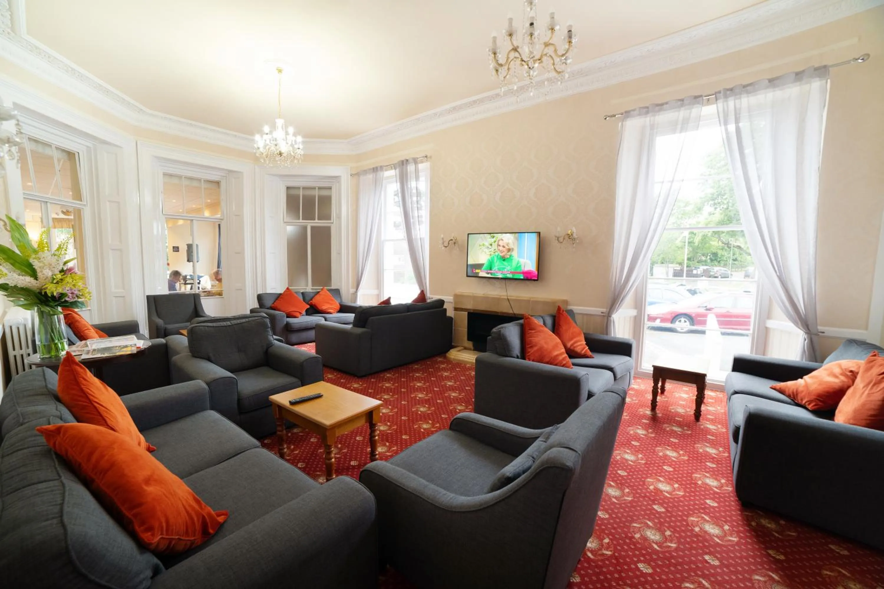 Communal lounge/ TV room in Devonshire Hotel