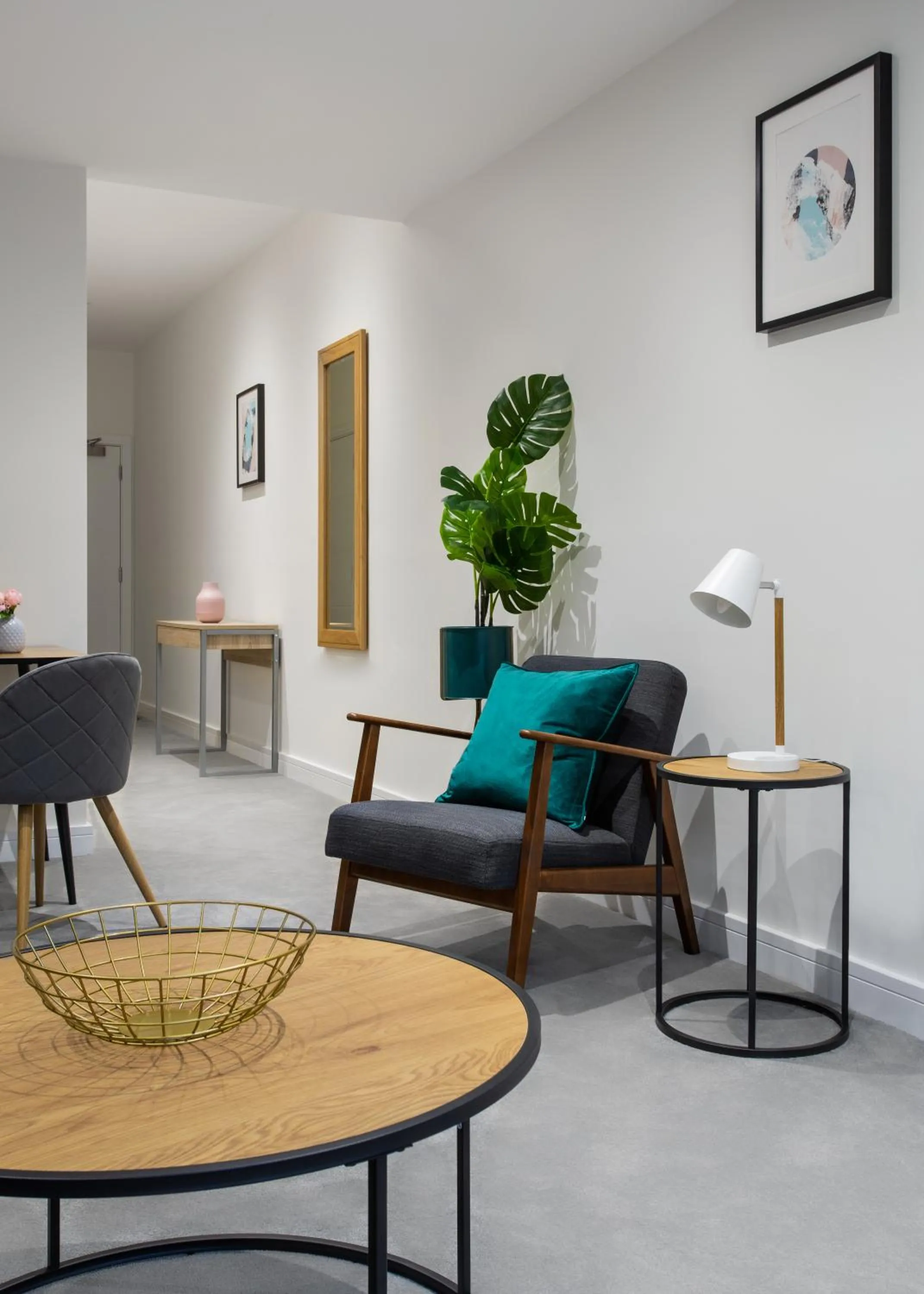 Seating area in Queens Park by Viridian Apartments