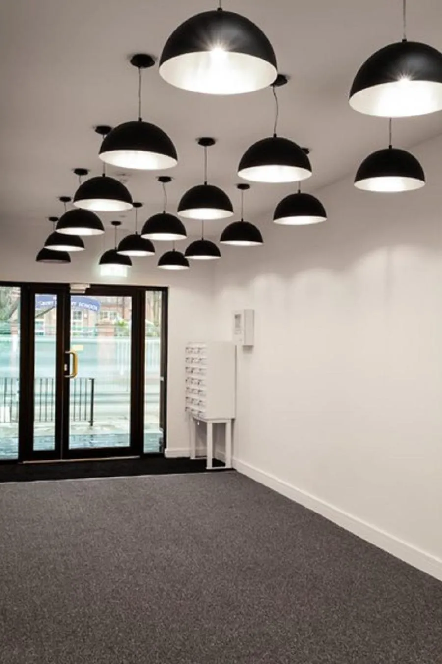 Lobby or reception in Queens Park by Viridian Apartments