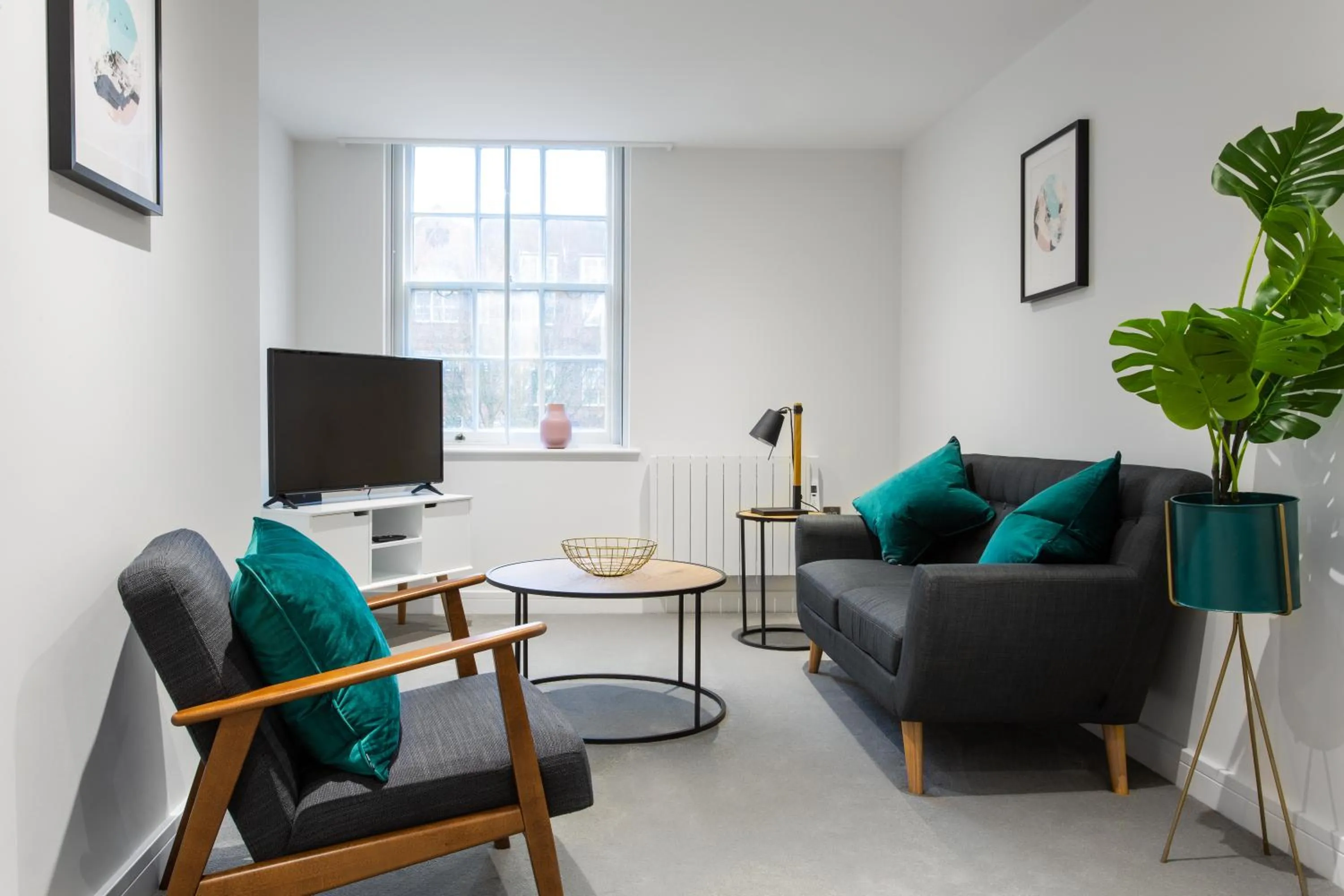 Living room in Queens Park by Viridian Apartments