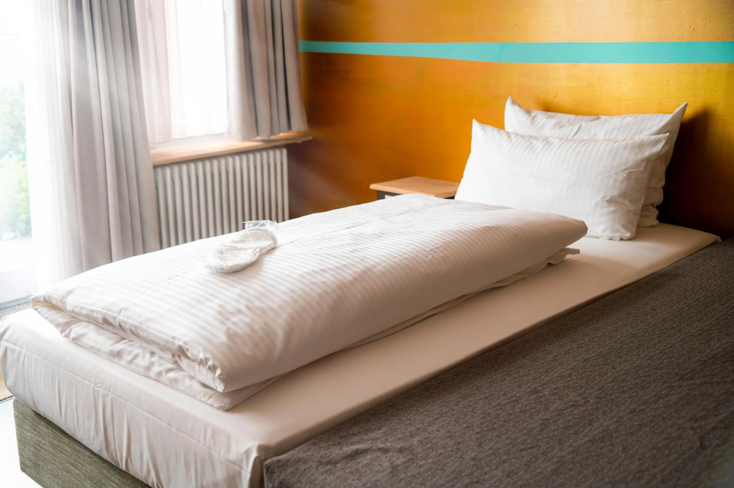 Bed in Abalon Hotel ideal