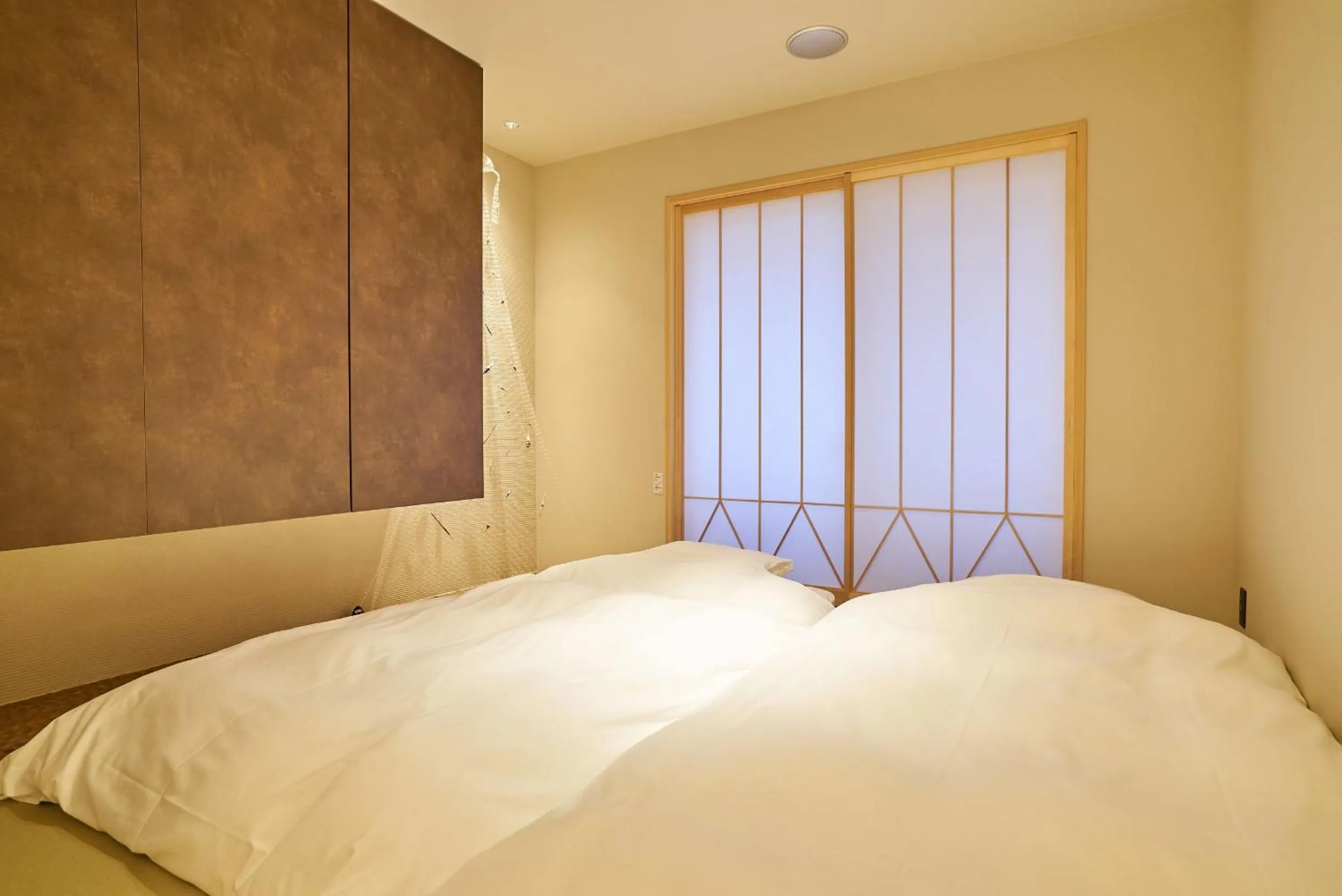 Living room, Bed in 凜庵 LIAN_KANAZAWA