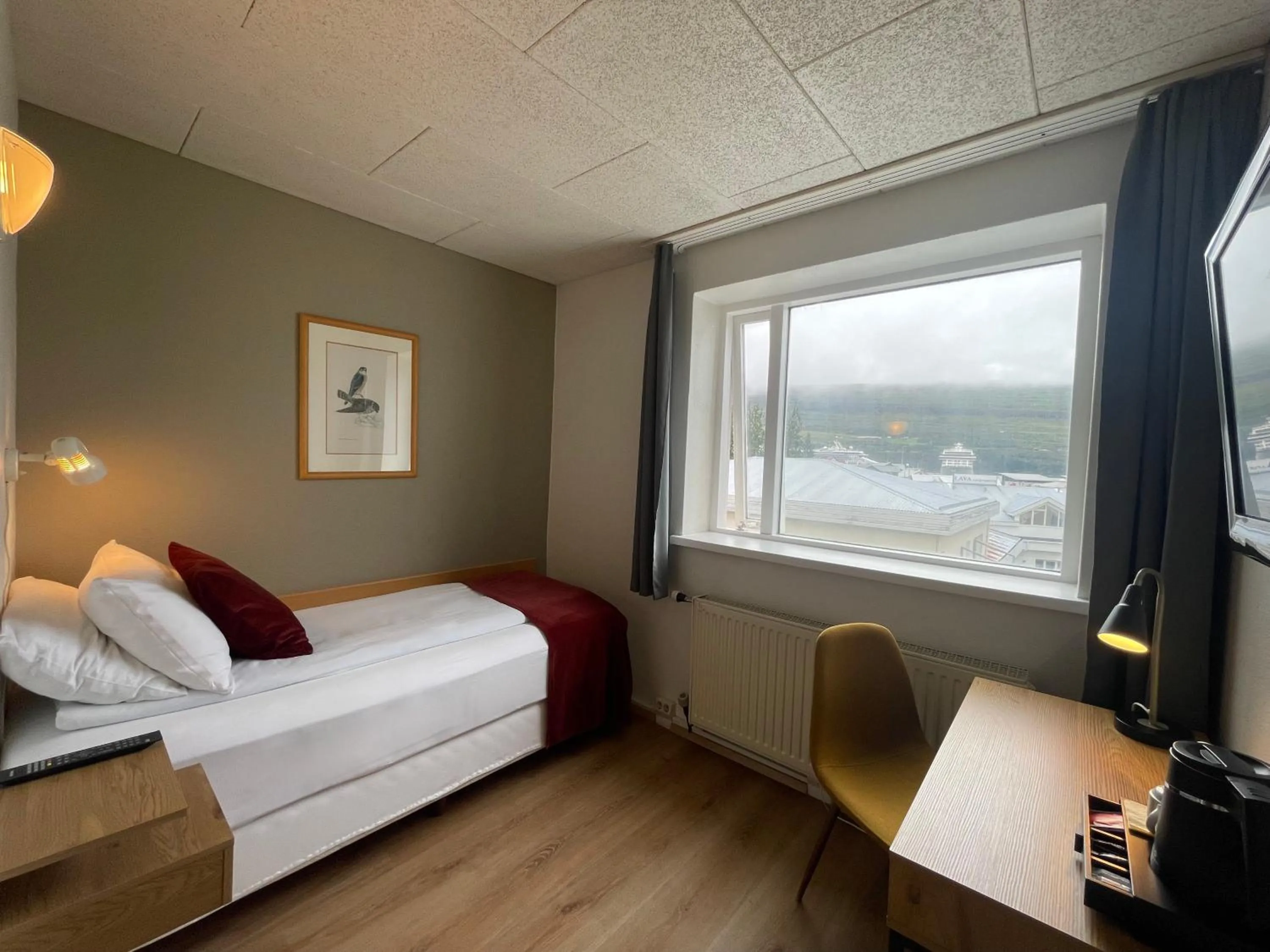 Photo of the whole room, Bed in Hotel Norðurland