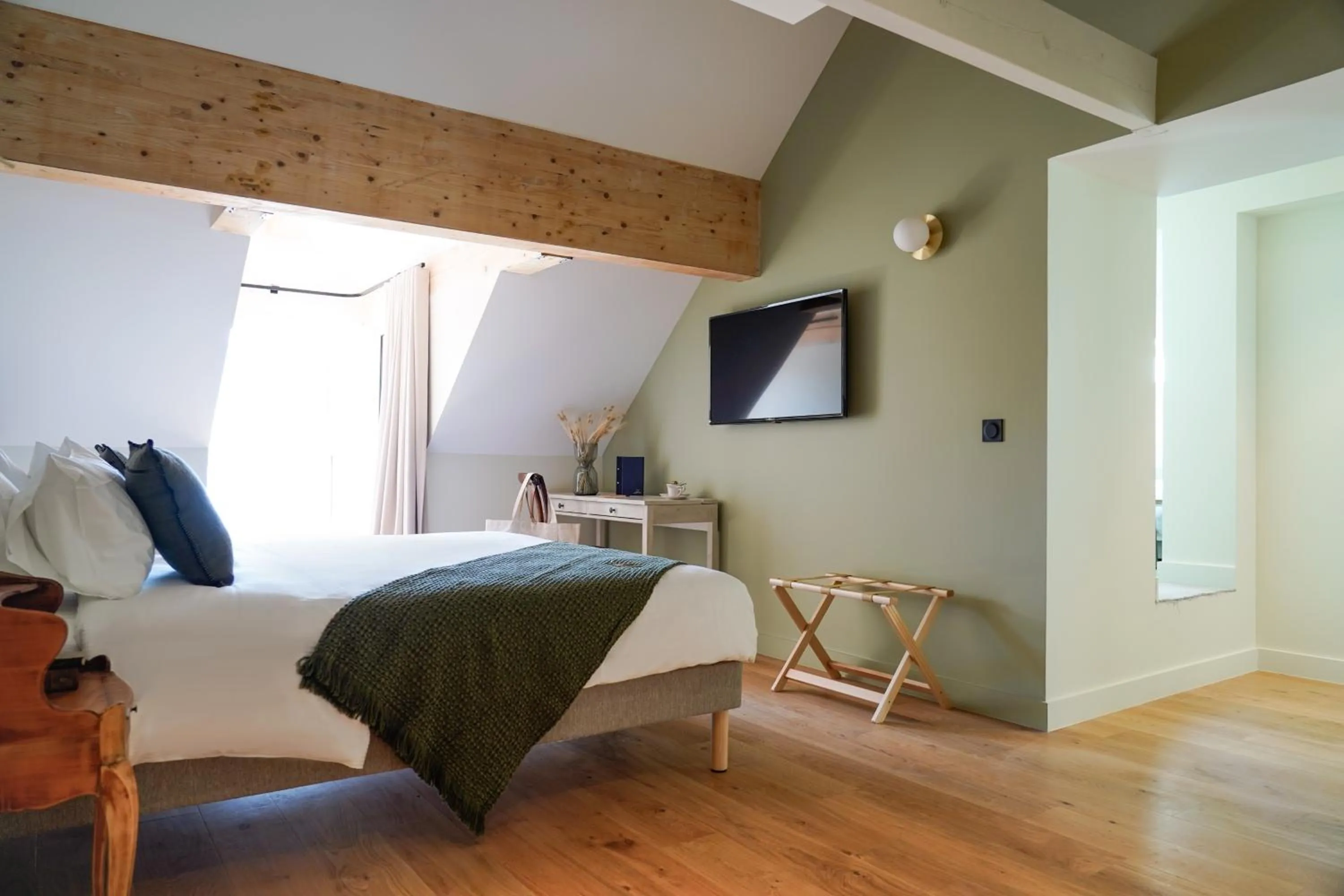 Photo of the whole room, Bed in Hôtel Le Mouton Bleu