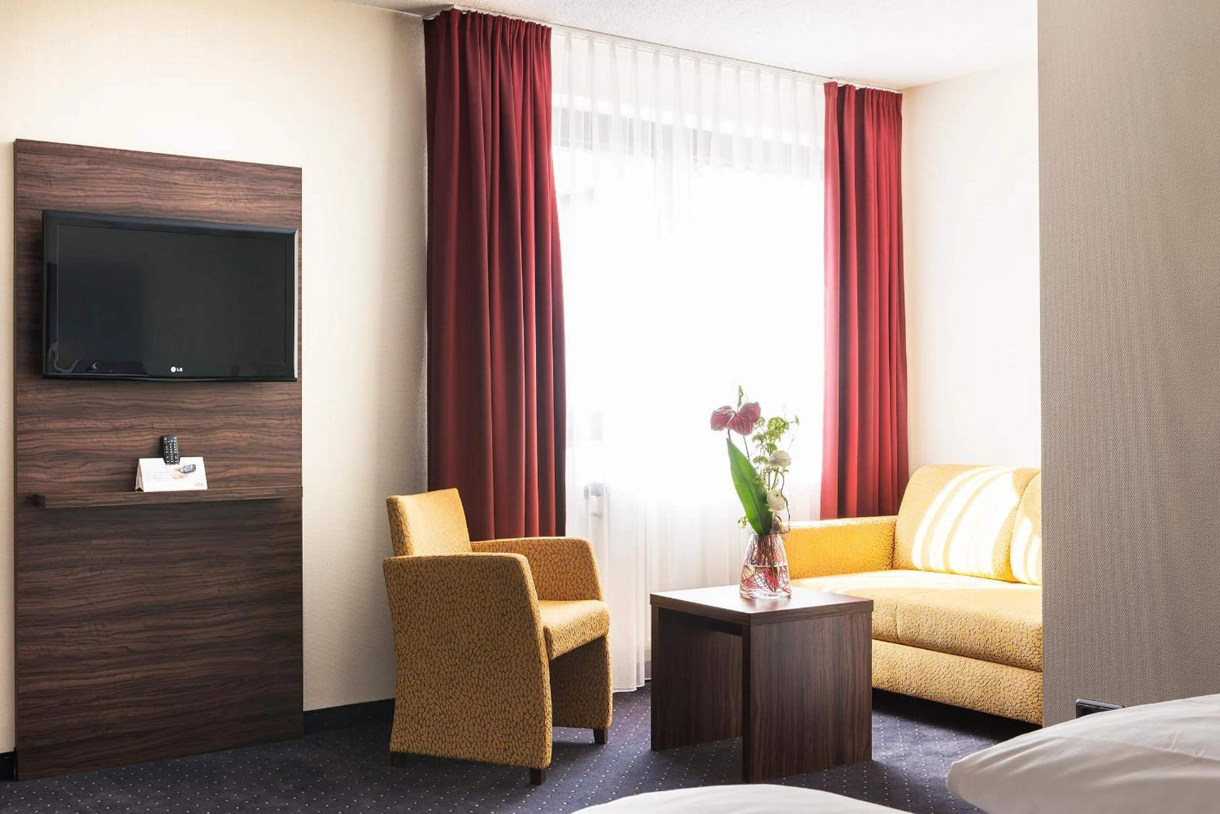 Photo of the whole room, Bed in Adler Hotel & Restaurant Groß-Gerau