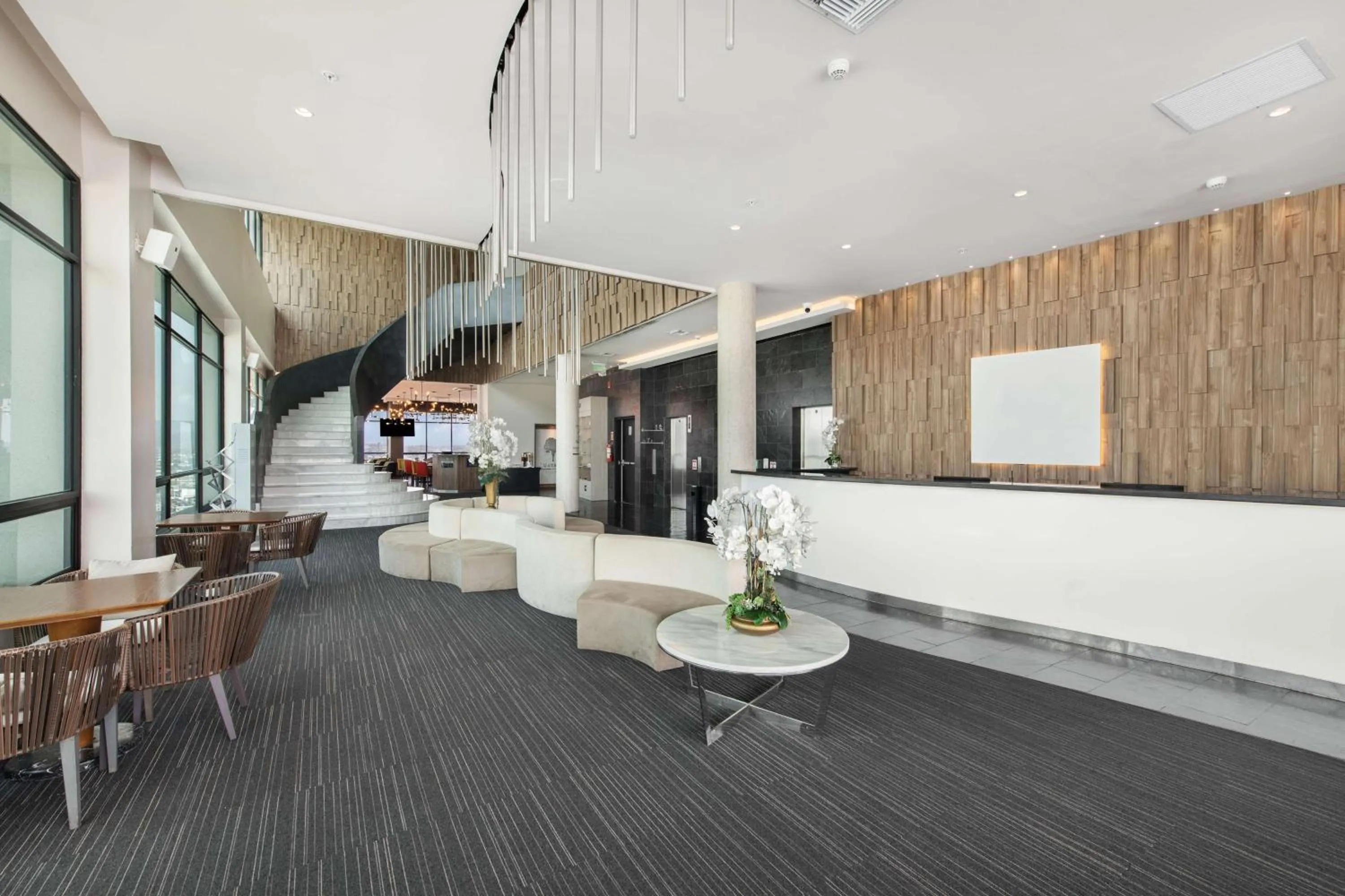 Lobby or reception in River Garden Hotel + Suites