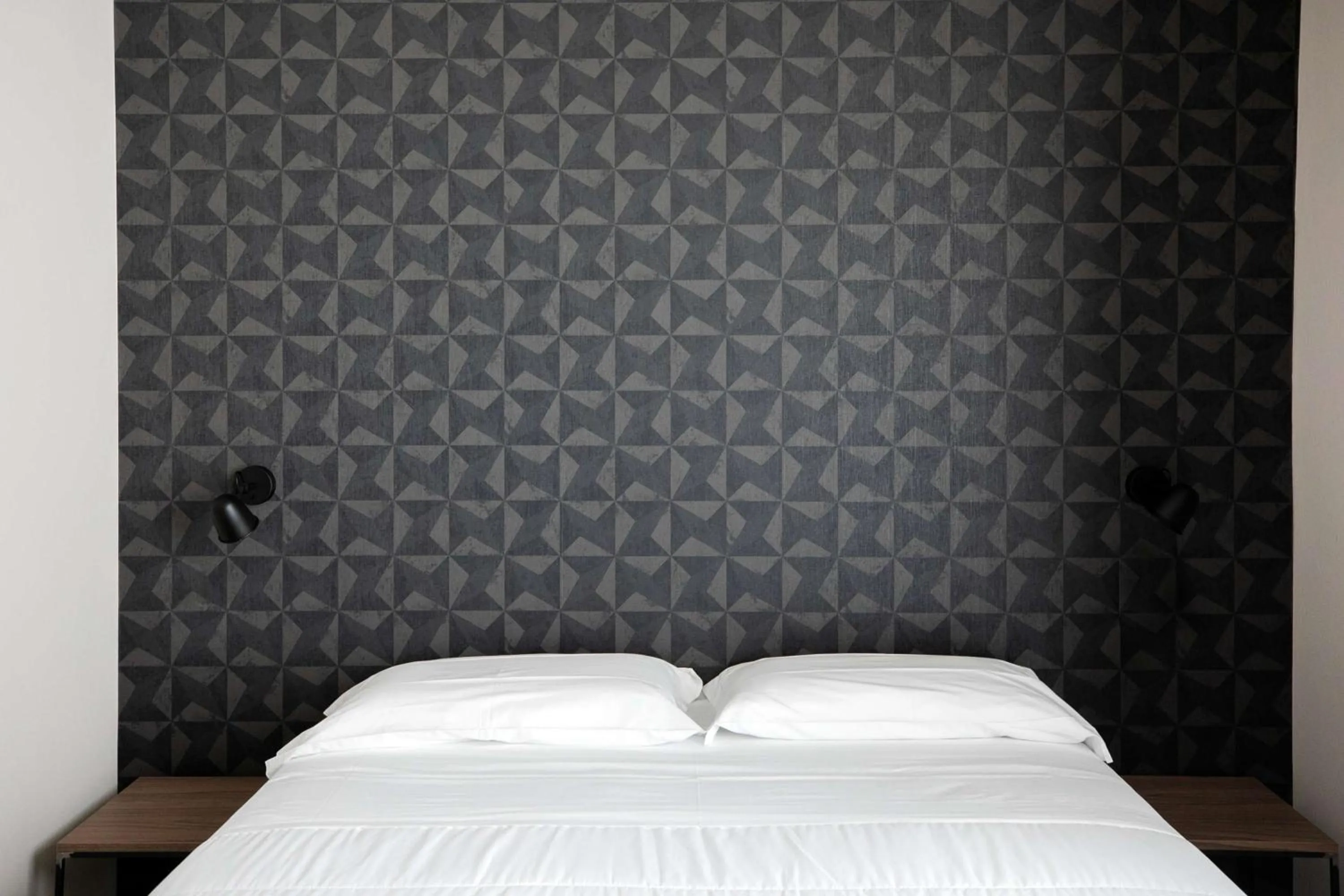 Bed in Hotel Benvenuto