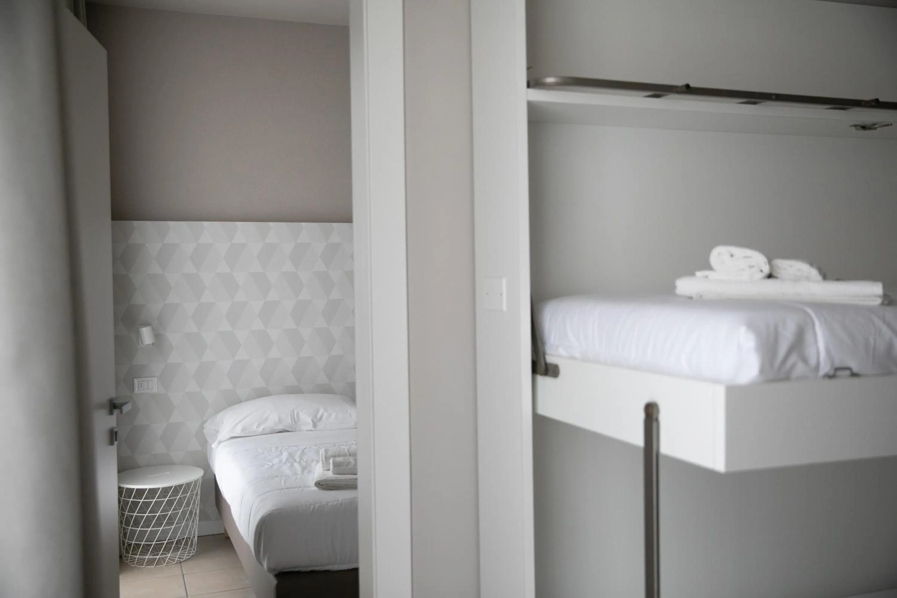 Bed in Hotel Benvenuto