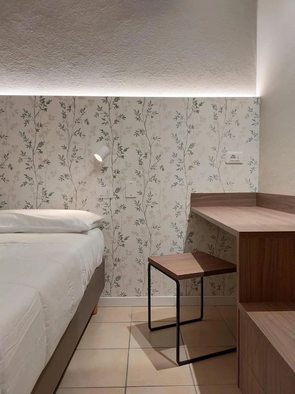 Bed in Hotel Benvenuto