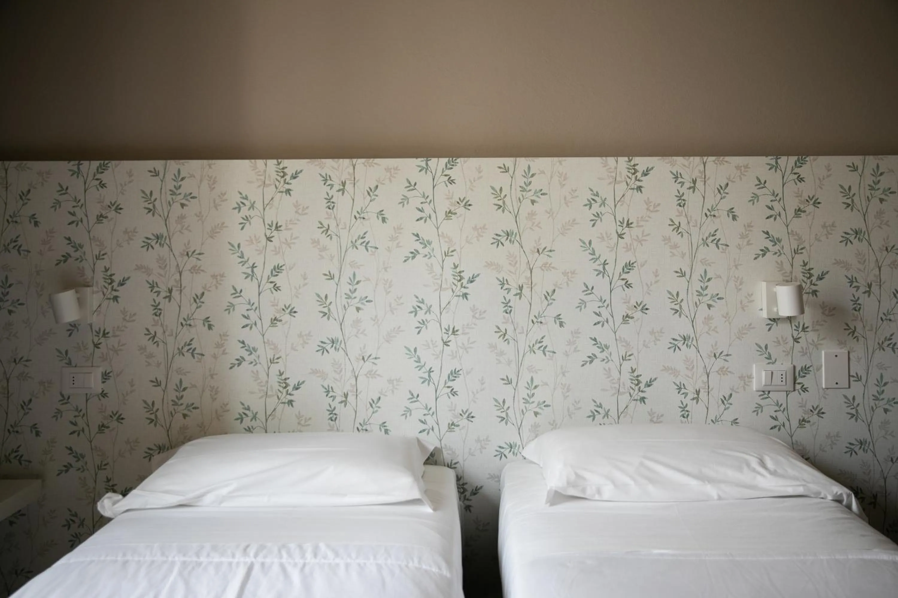 Bed in Hotel Benvenuto