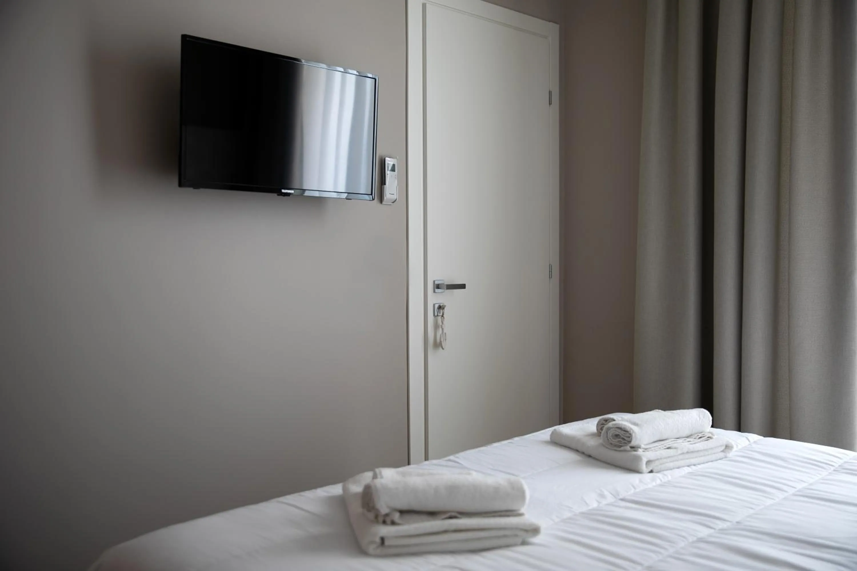 Bed in Hotel Benvenuto