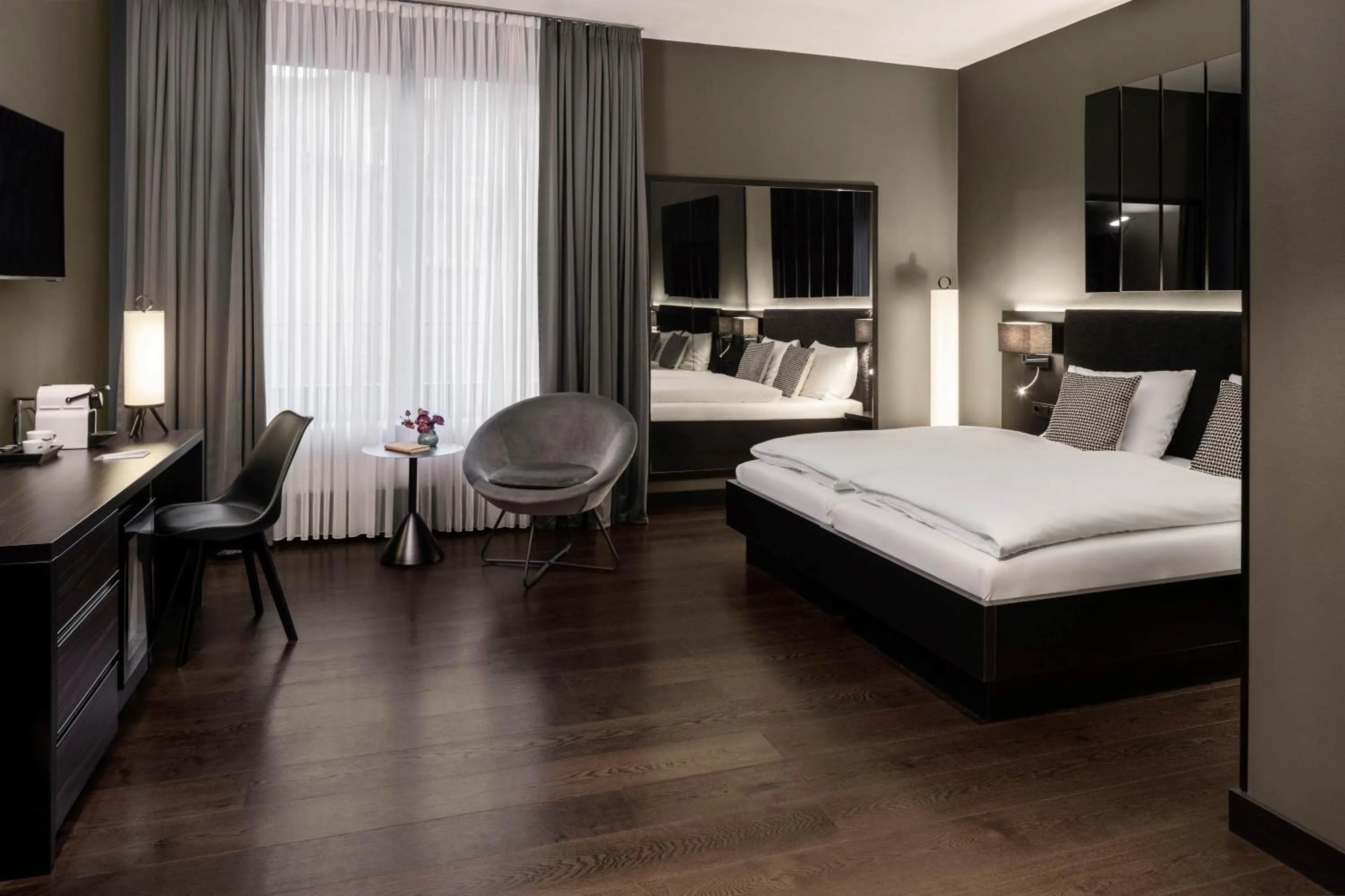 Bed in Hotel AMANO Düsseldorf