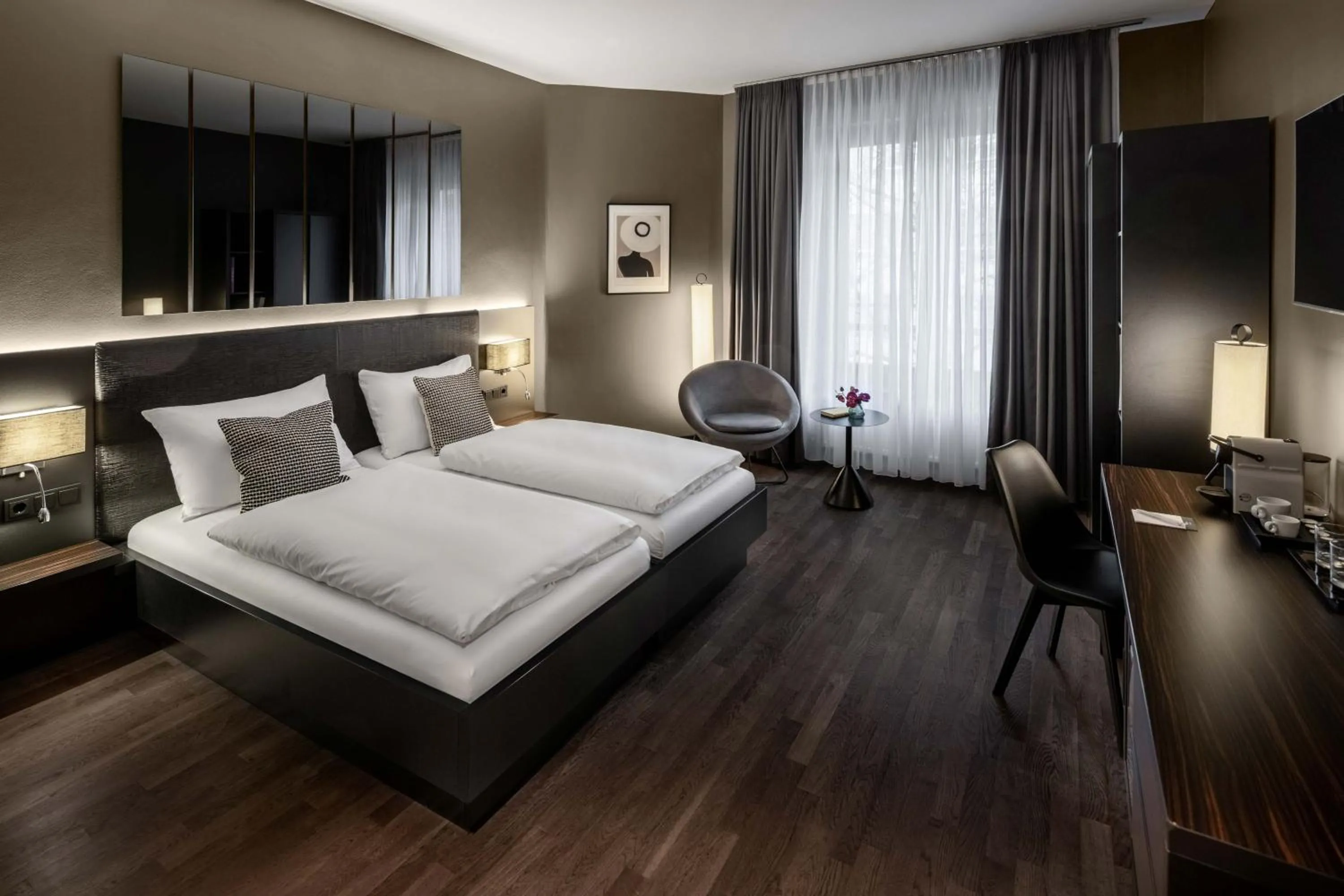 Bed in Hotel AMANO Düsseldorf