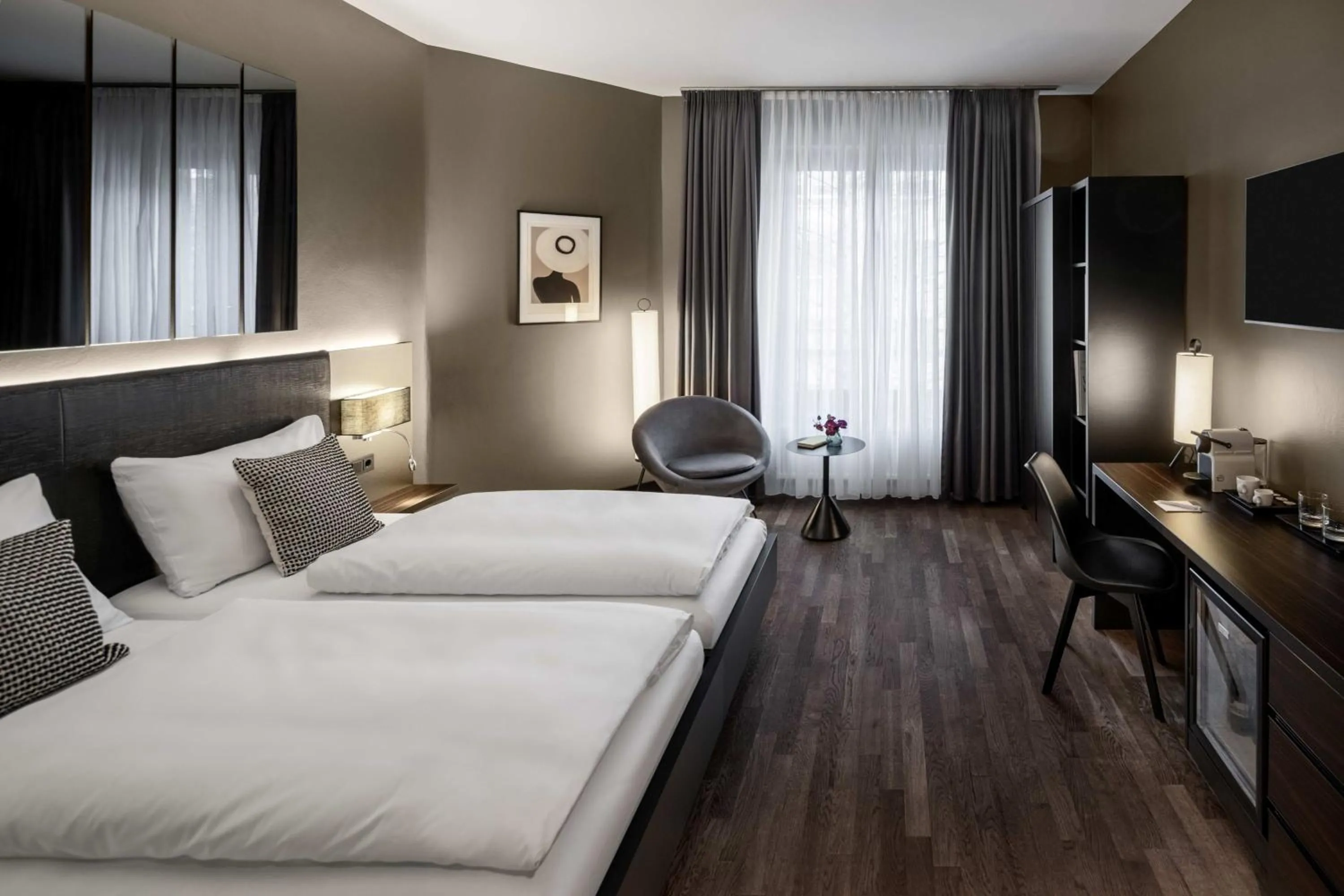 Bed in Hotel AMANO Düsseldorf