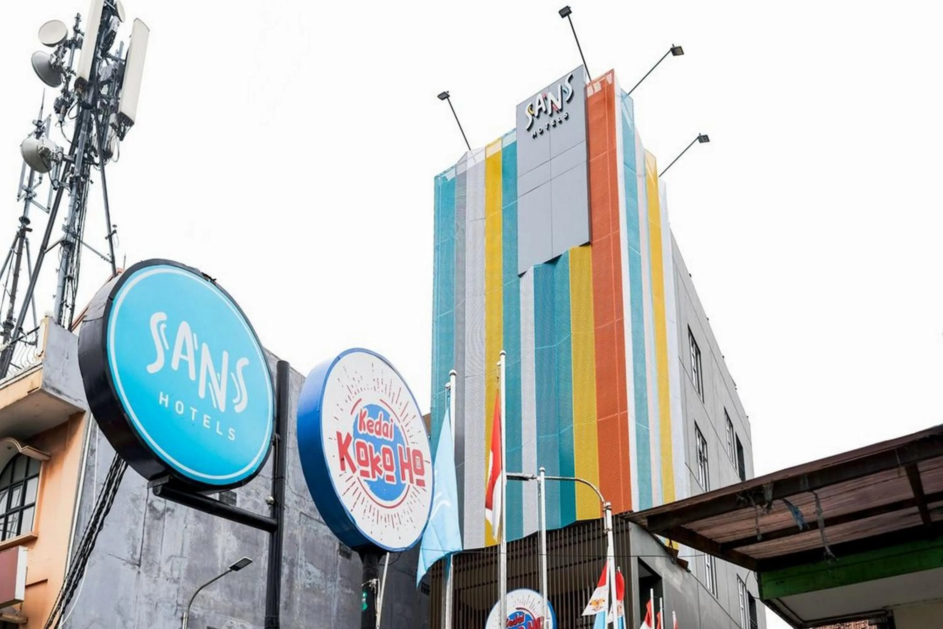 Property logo or sign in Sans Hotel Puri Indah Jakarta