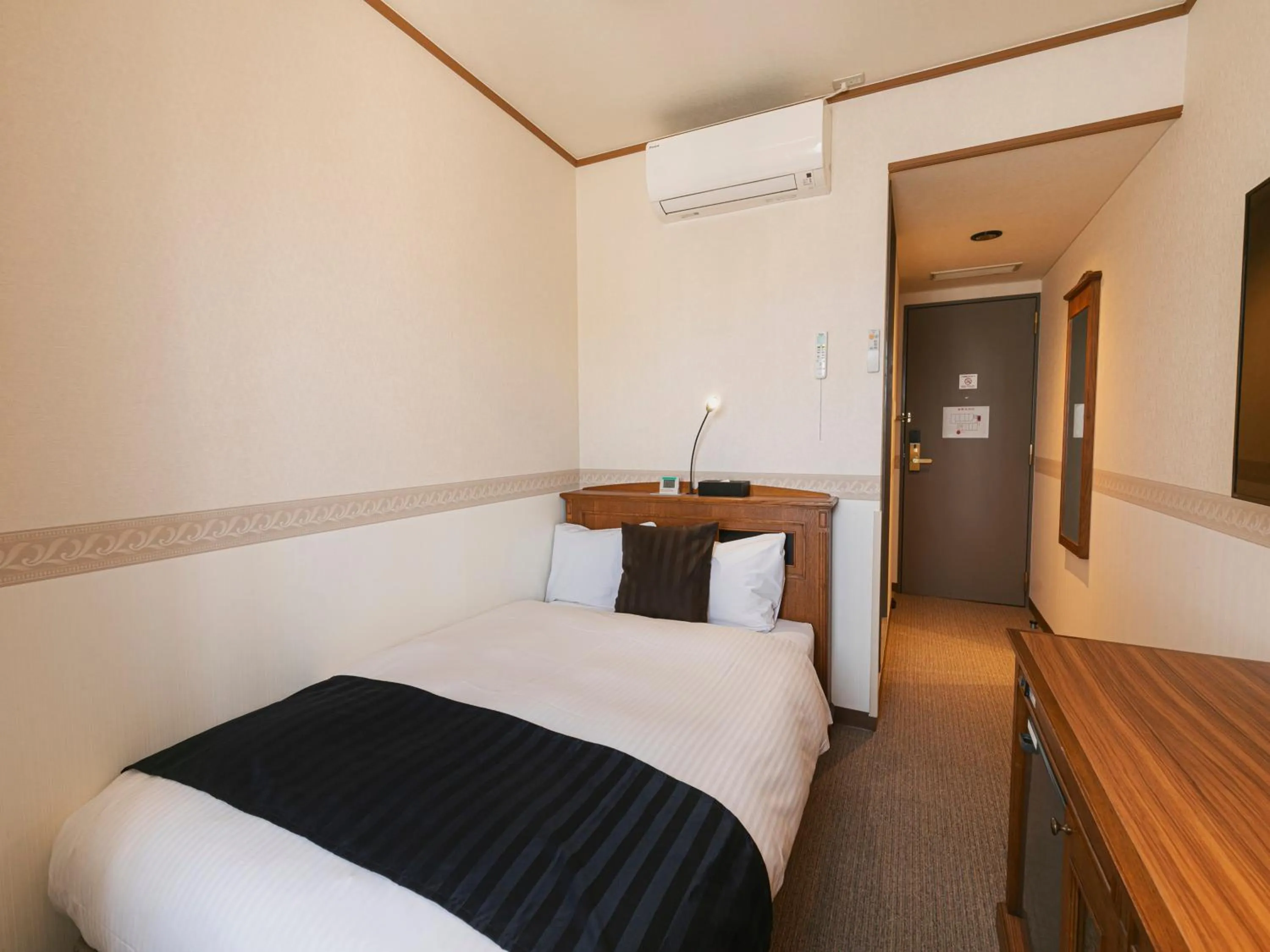 Bed in Hotel Arthur KITAHAMA BASE