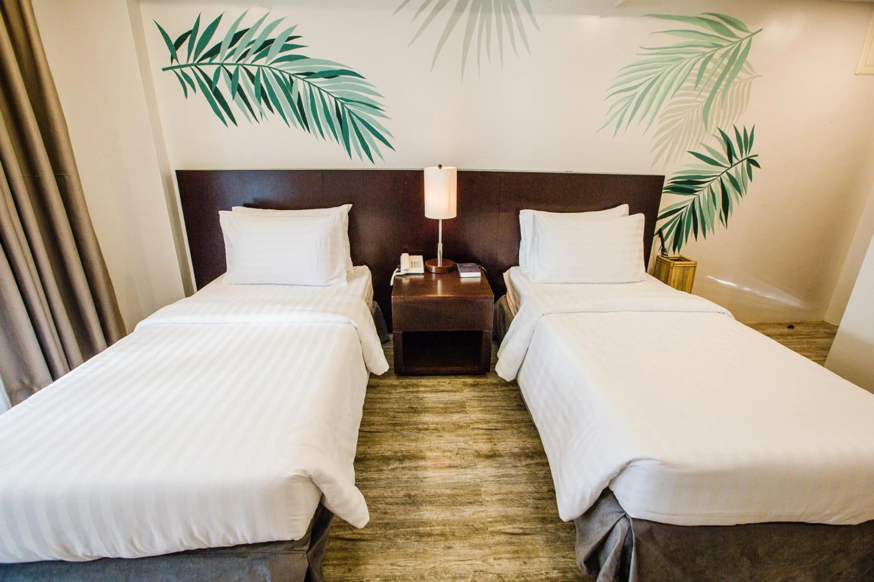 Bed in Holiday Suites Port Barton