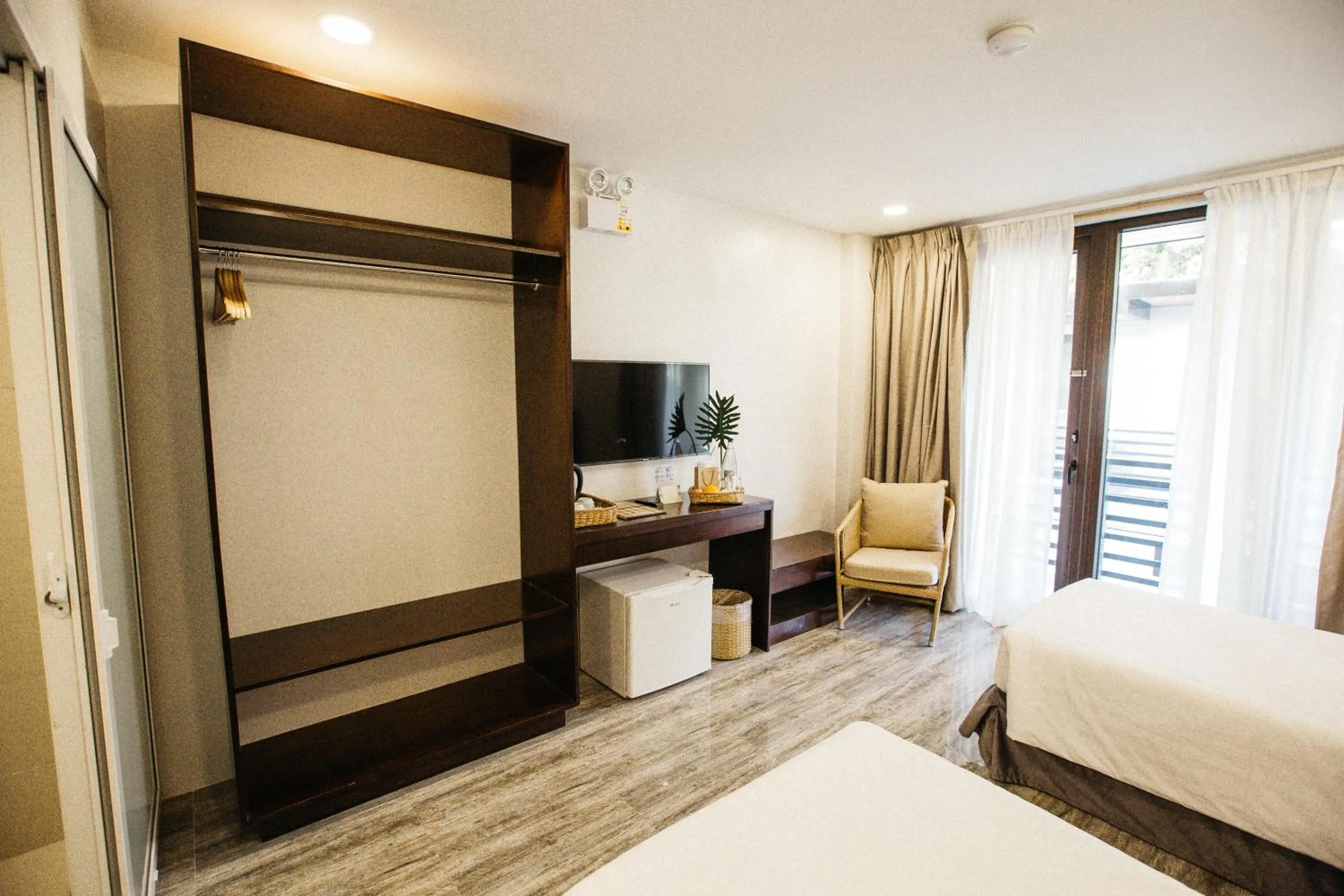 Bed in Holiday Suites Port Barton