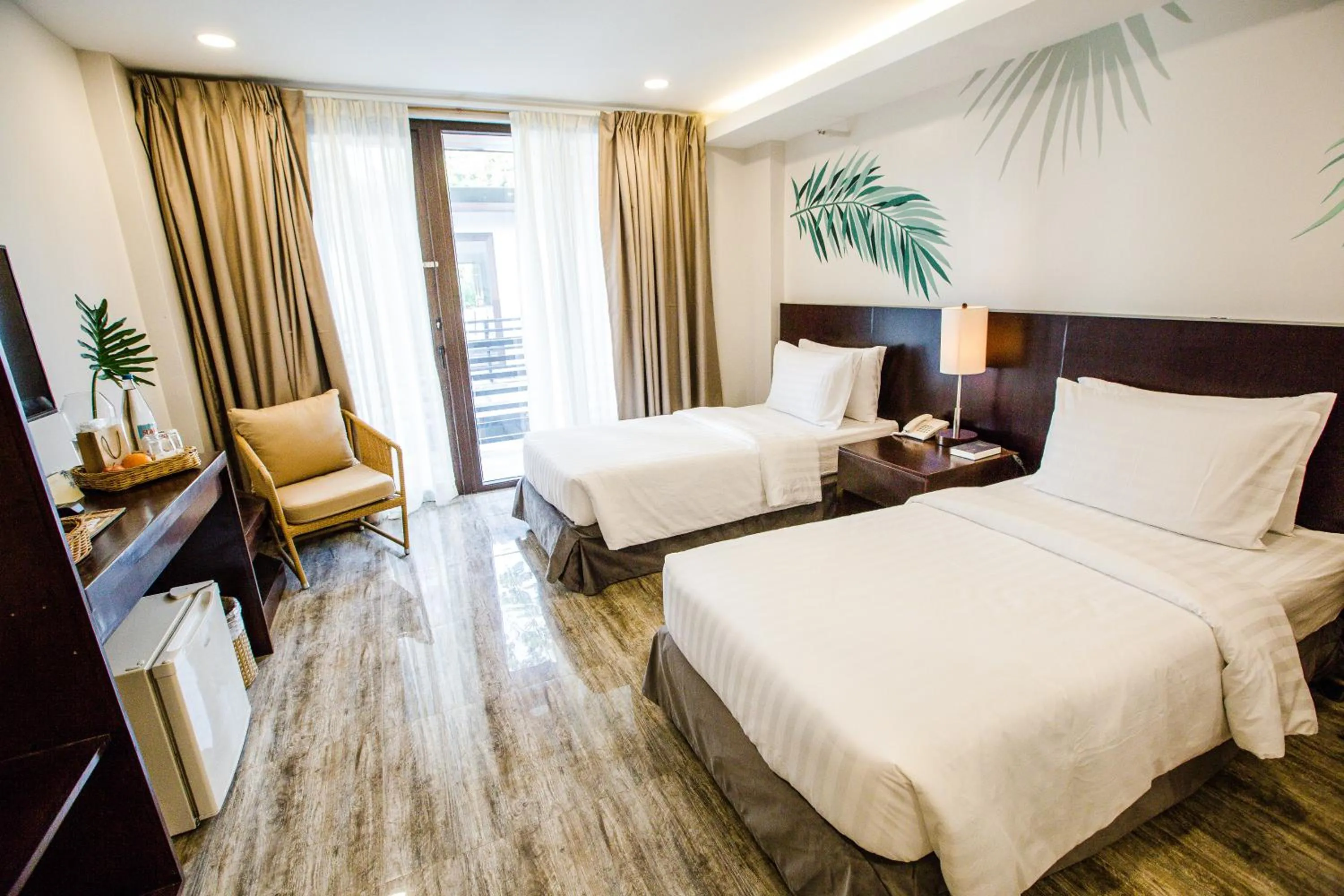 Bed in Holiday Suites Port Barton